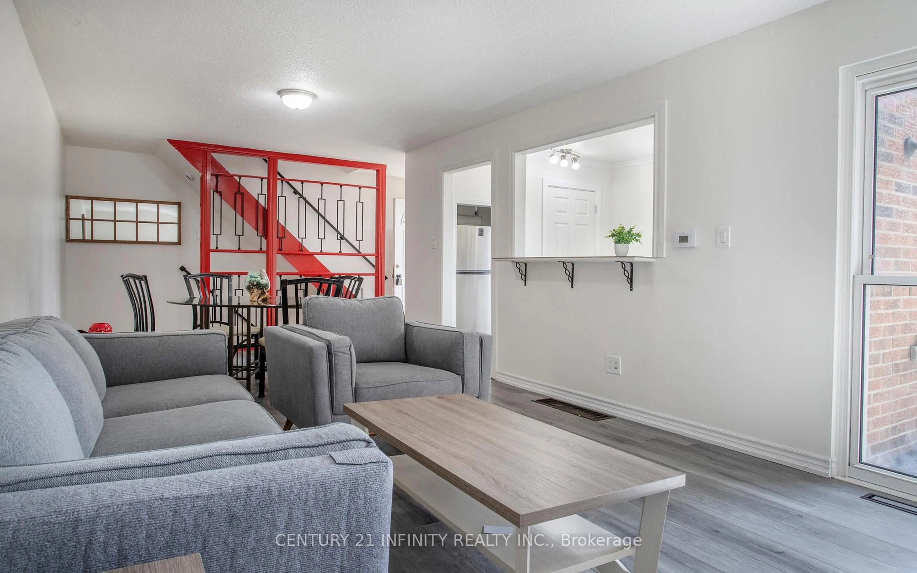 Living room with furniture, unknown for 101 Dovedale Dr #33, Whitby Ontario L1N 1Z7