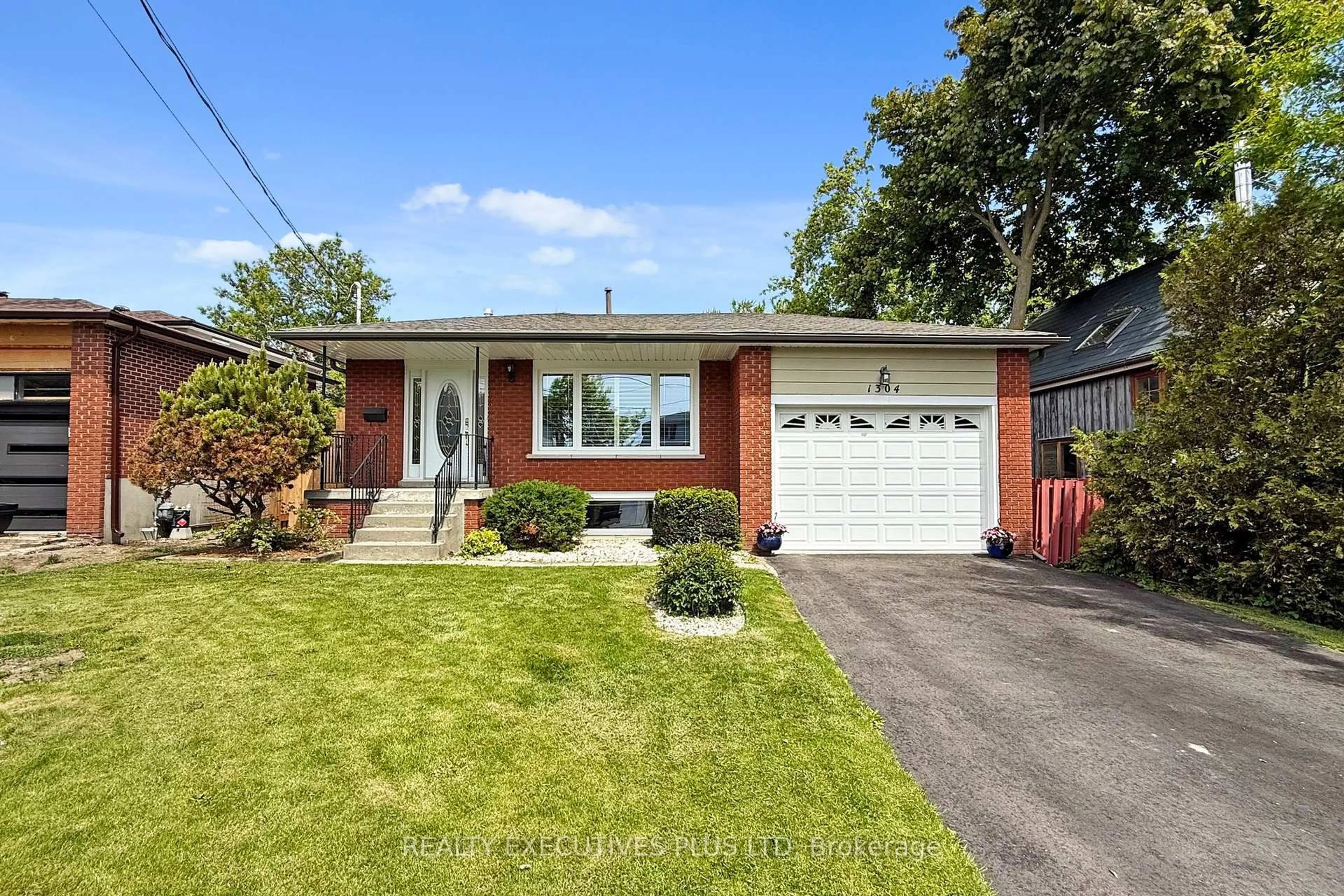 Home with brick exterior material, street for 1304 Wharf St, Pickering Ontario L1W 1A4