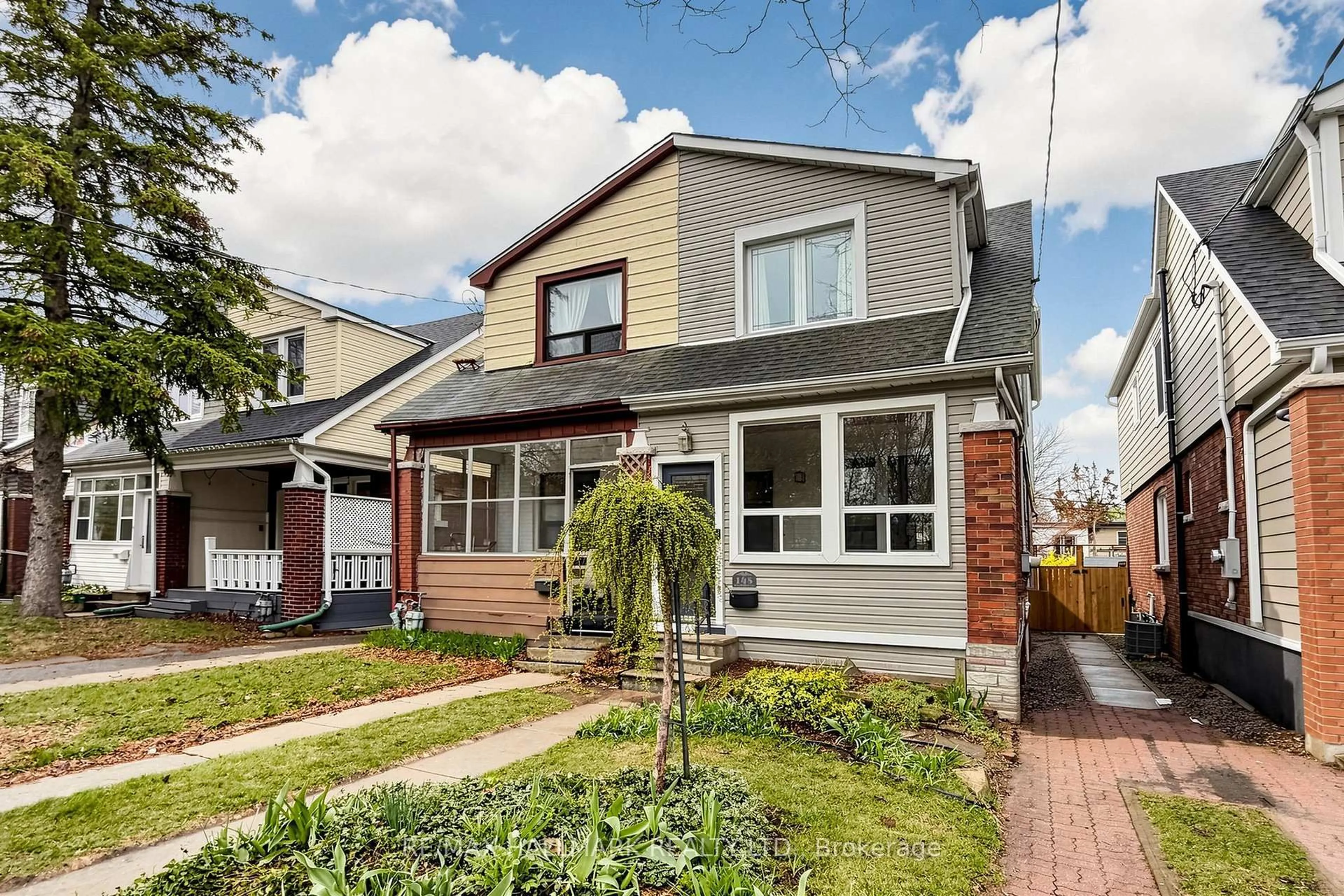 Home with brick exterior material, street for 145 Wildwood Cres, Toronto Ontario M4L 2K9