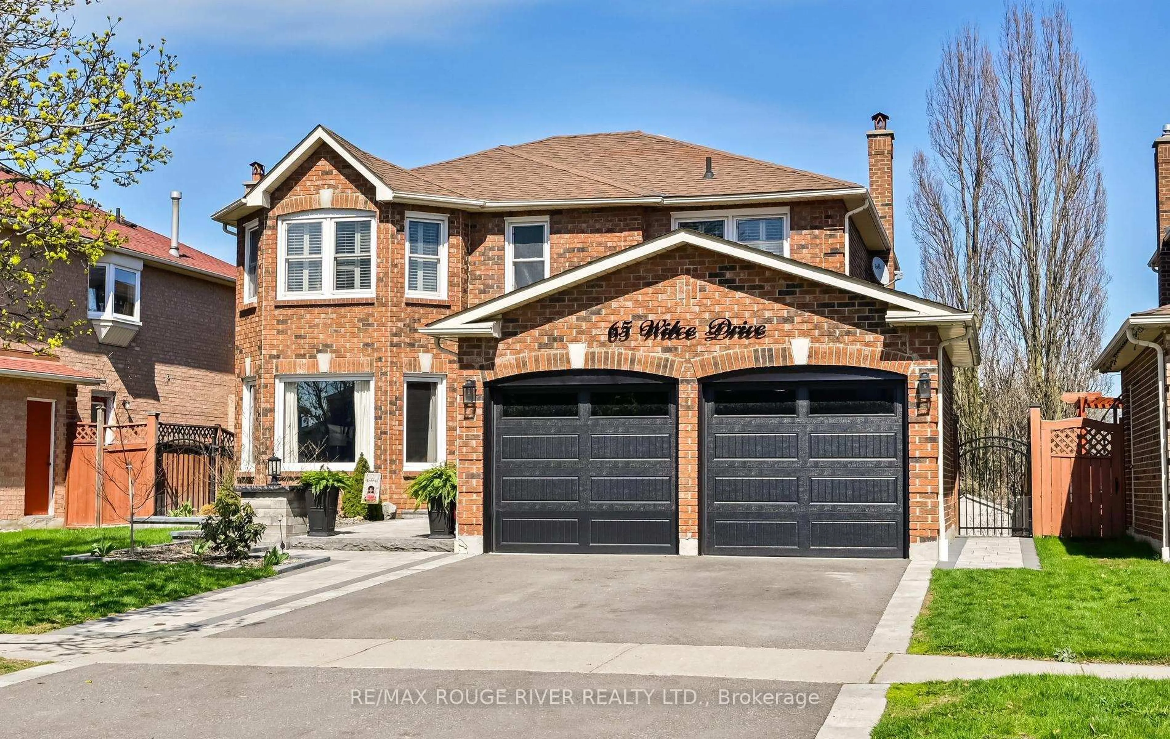 Home with brick exterior material, street for 65 Wilce Dr, Ajax Ontario L1T 3K2