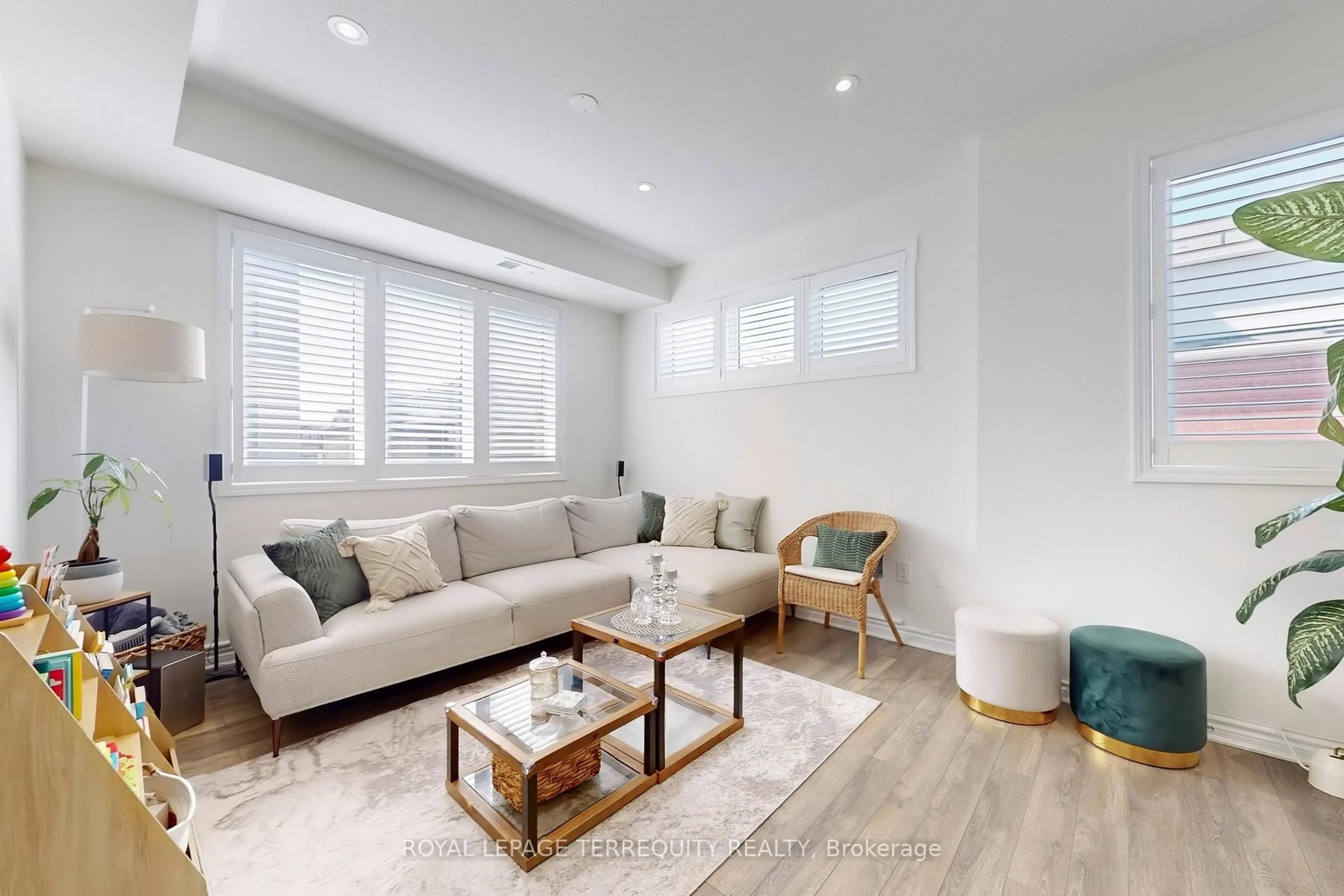 Living room with furniture, wood/laminate floor for 1148 Dragonfly Ave #608, Pickering Ontario L1X 0H5