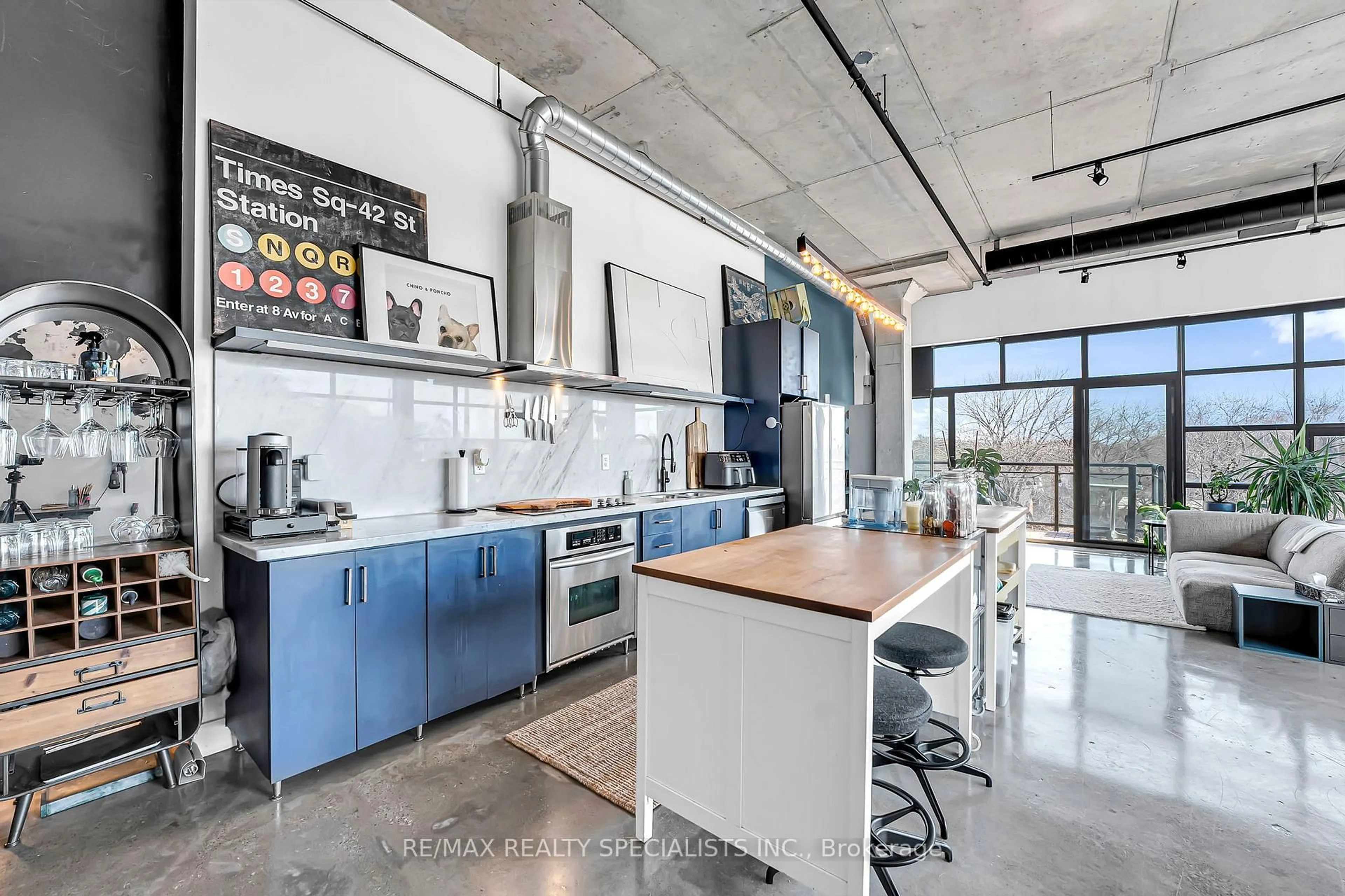 Open concept kitchen, cement floor for 68 Broadview Ave #520, Toronto Ontario M4M 2E8
