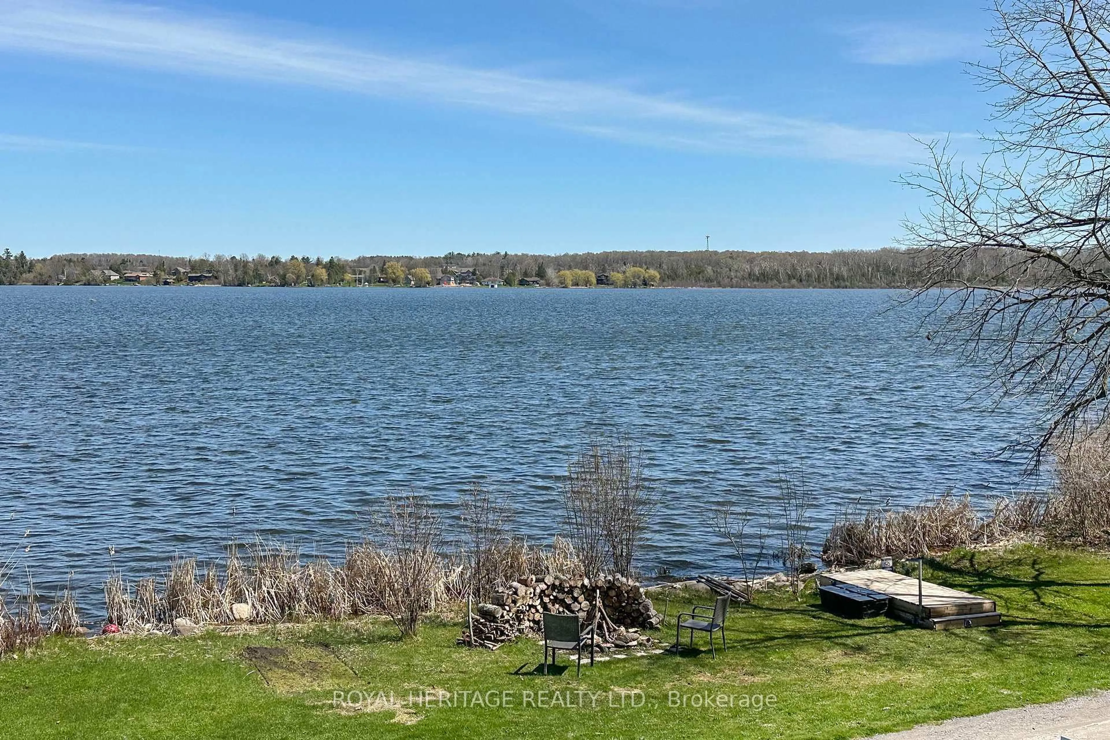 A pic from outside/outdoor area/front of a property/back of a property/a pic from drone, water/lake/river/ocean view for 56 Pine Point Lane, Scugog Ontario L9L 1B4