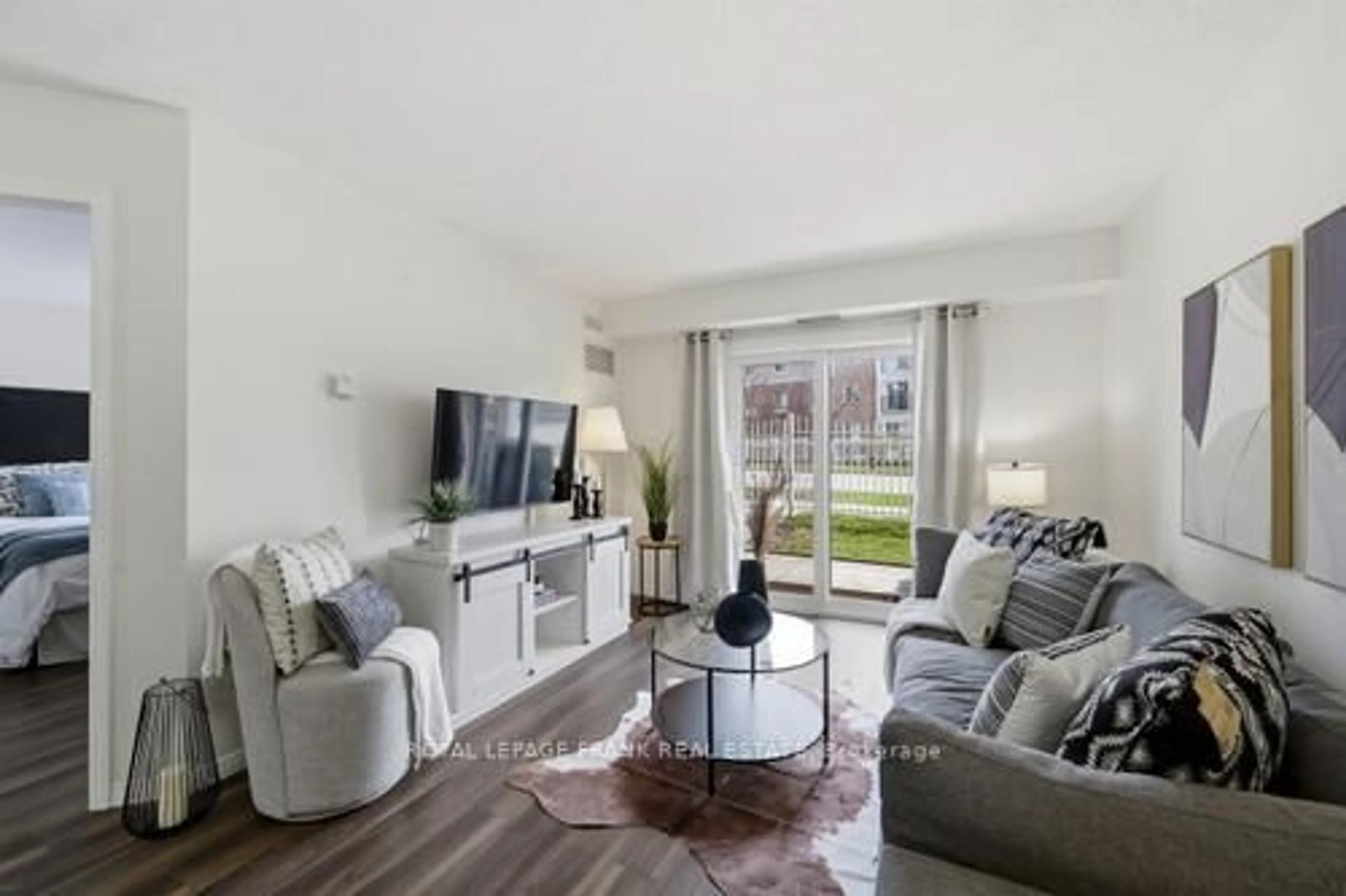 Living room with furniture, unknown for 102 Aspen Springs Dr #108, Clarington Ontario L1C 5N6