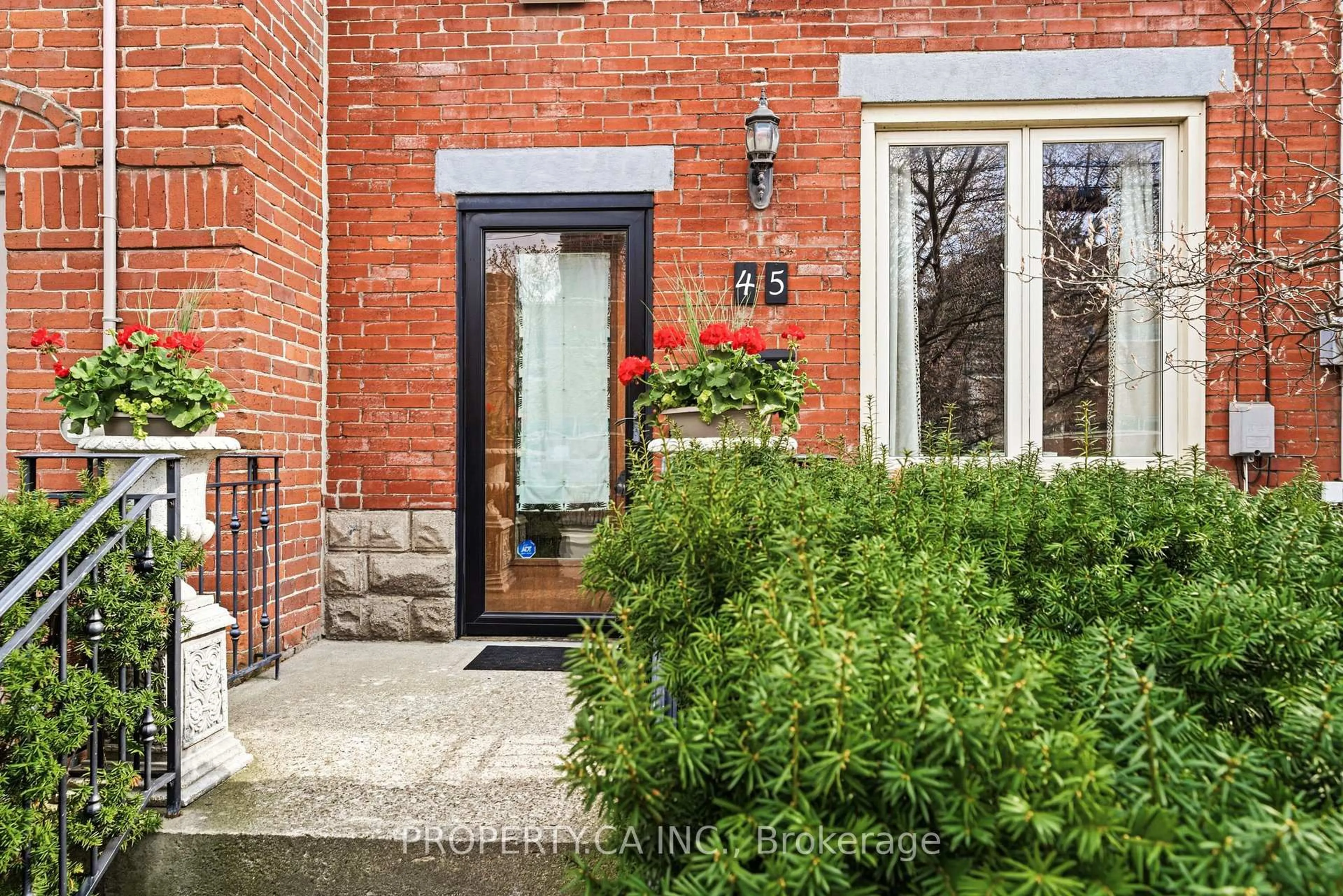 Home with brick exterior material, street for 45 Swanwick Ave, Toronto Ontario M4E 1Z4