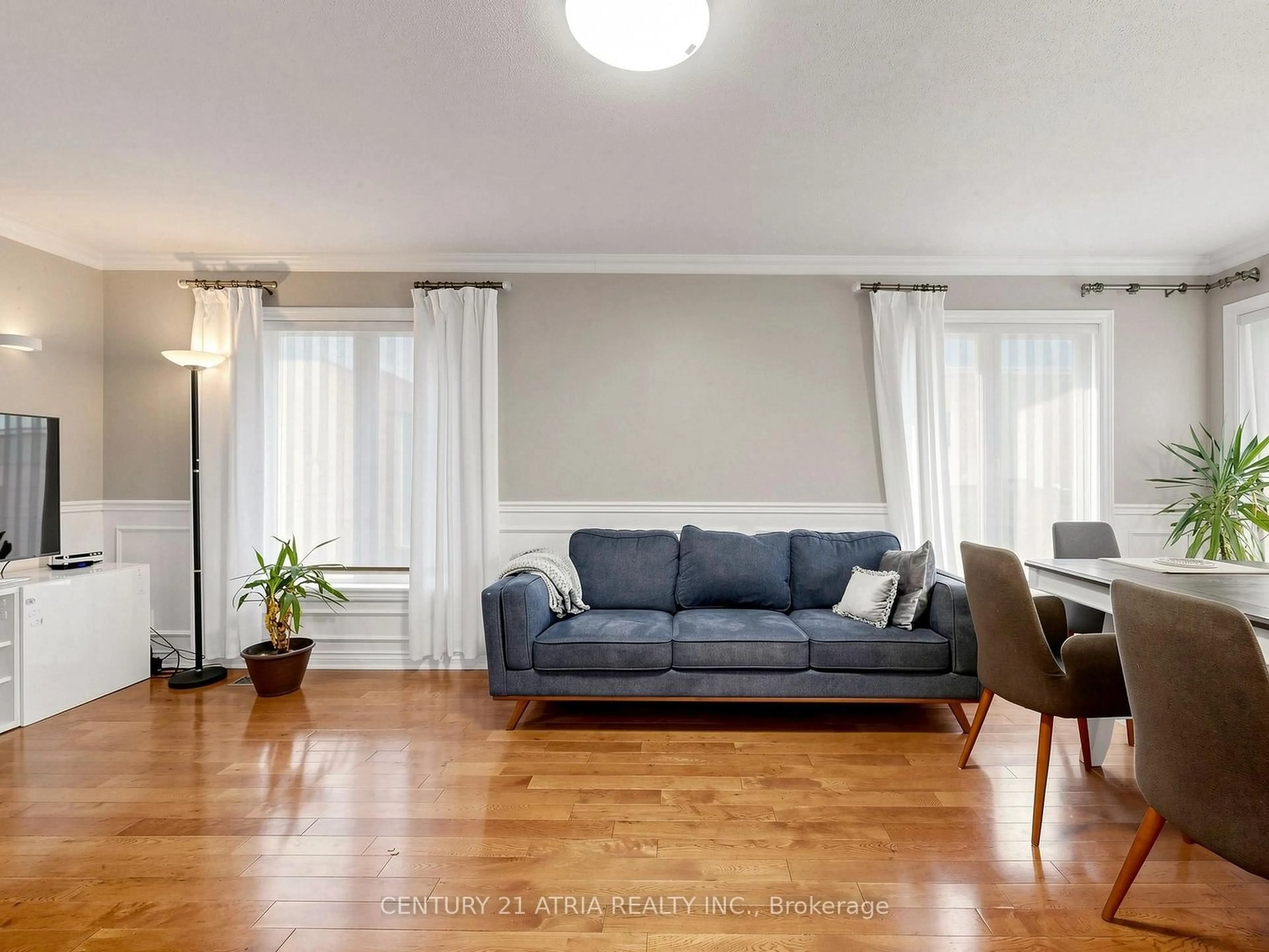 Living room with furniture, wood/laminate floor for 14 Robert Attersley Dr, Whitby Ontario L1R 3E3