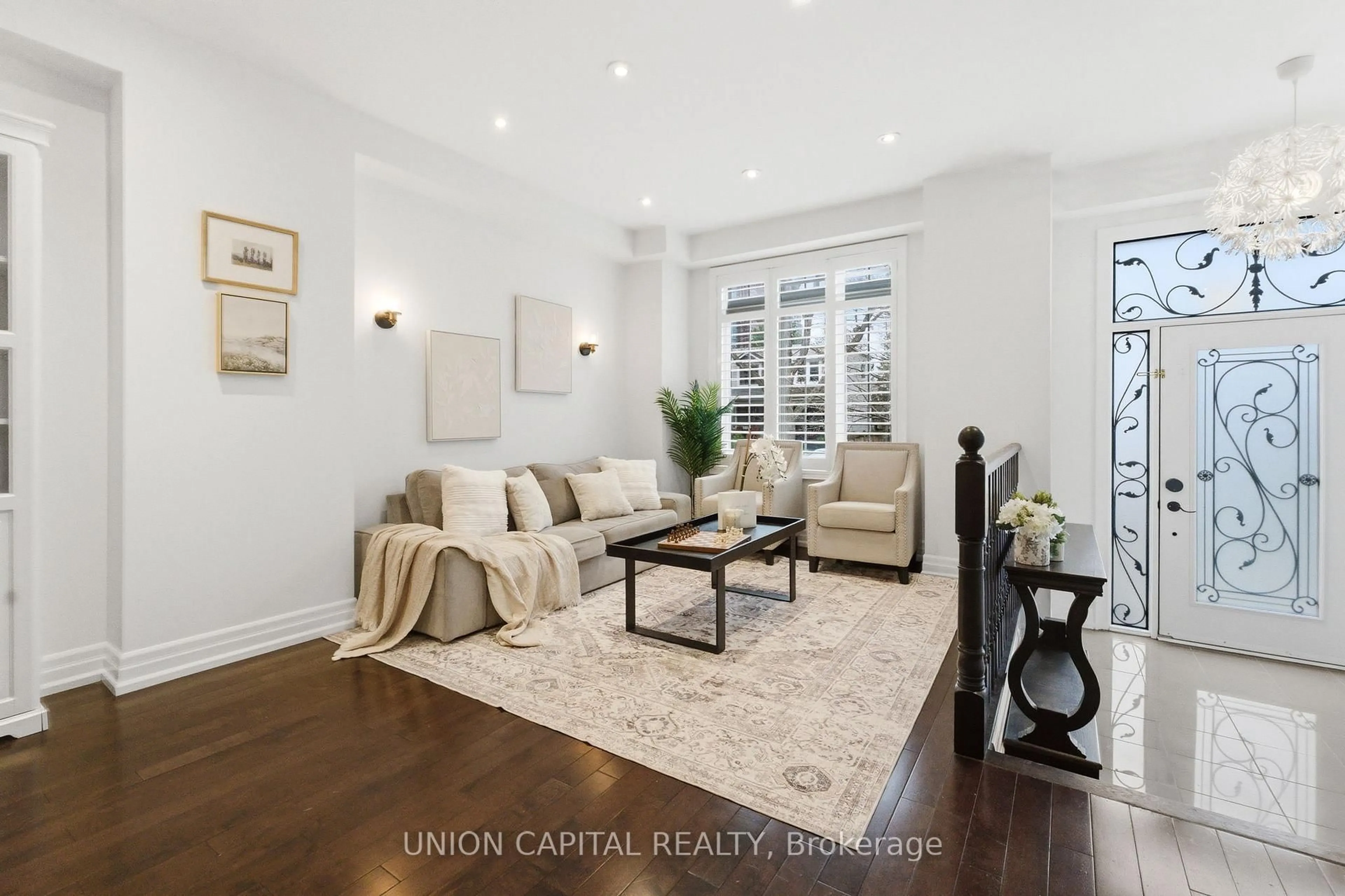 Living room with furniture, wood/laminate floor for 40A Norwood Rd, Toronto Ontario M4E 2S2