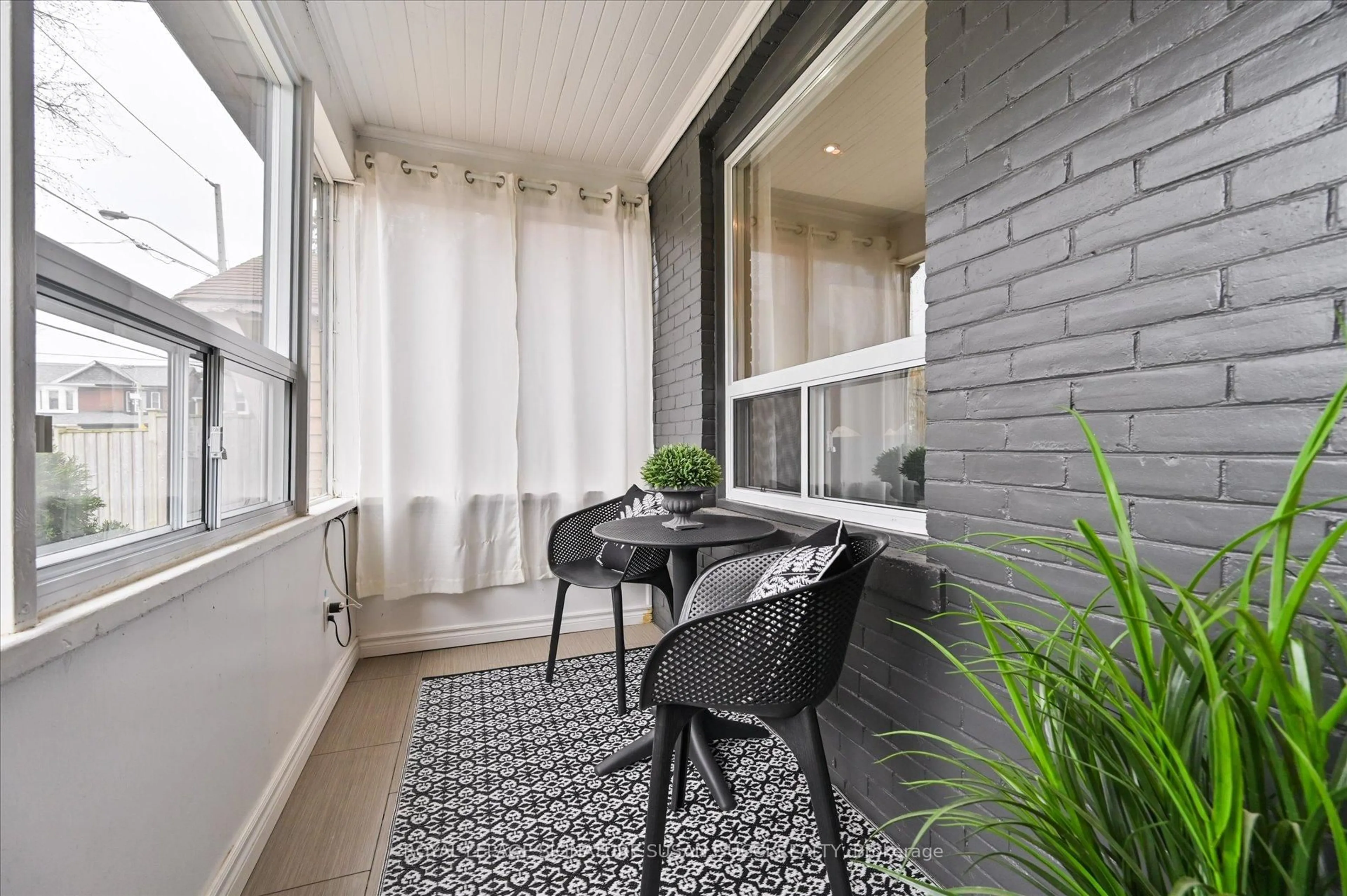Balcony in the apartment, street for 2 Newman Ave, Toronto Ontario M4C 5A4