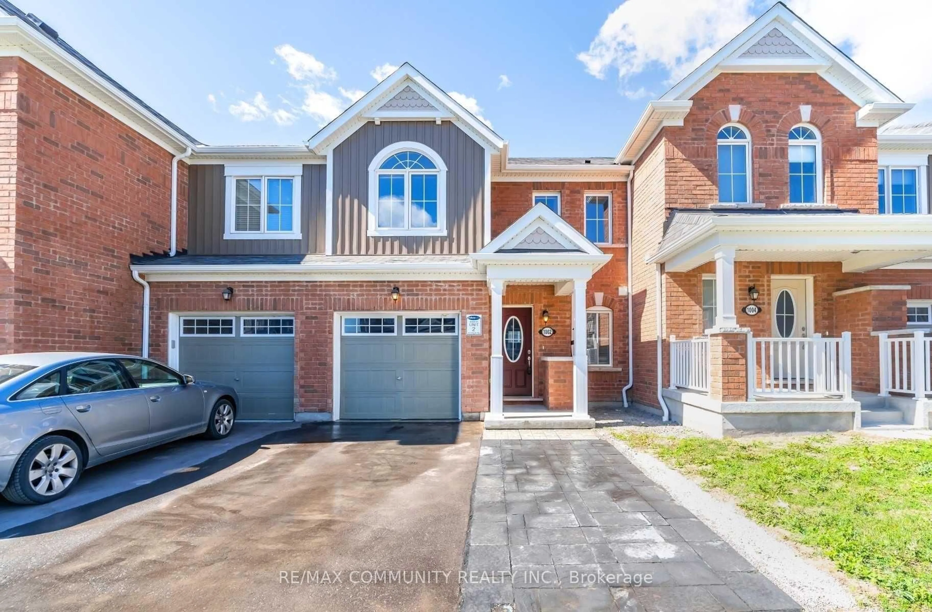 Home with brick exterior material, street for 1002 Reflection Pl, Pickering Ontario L1X 0E9