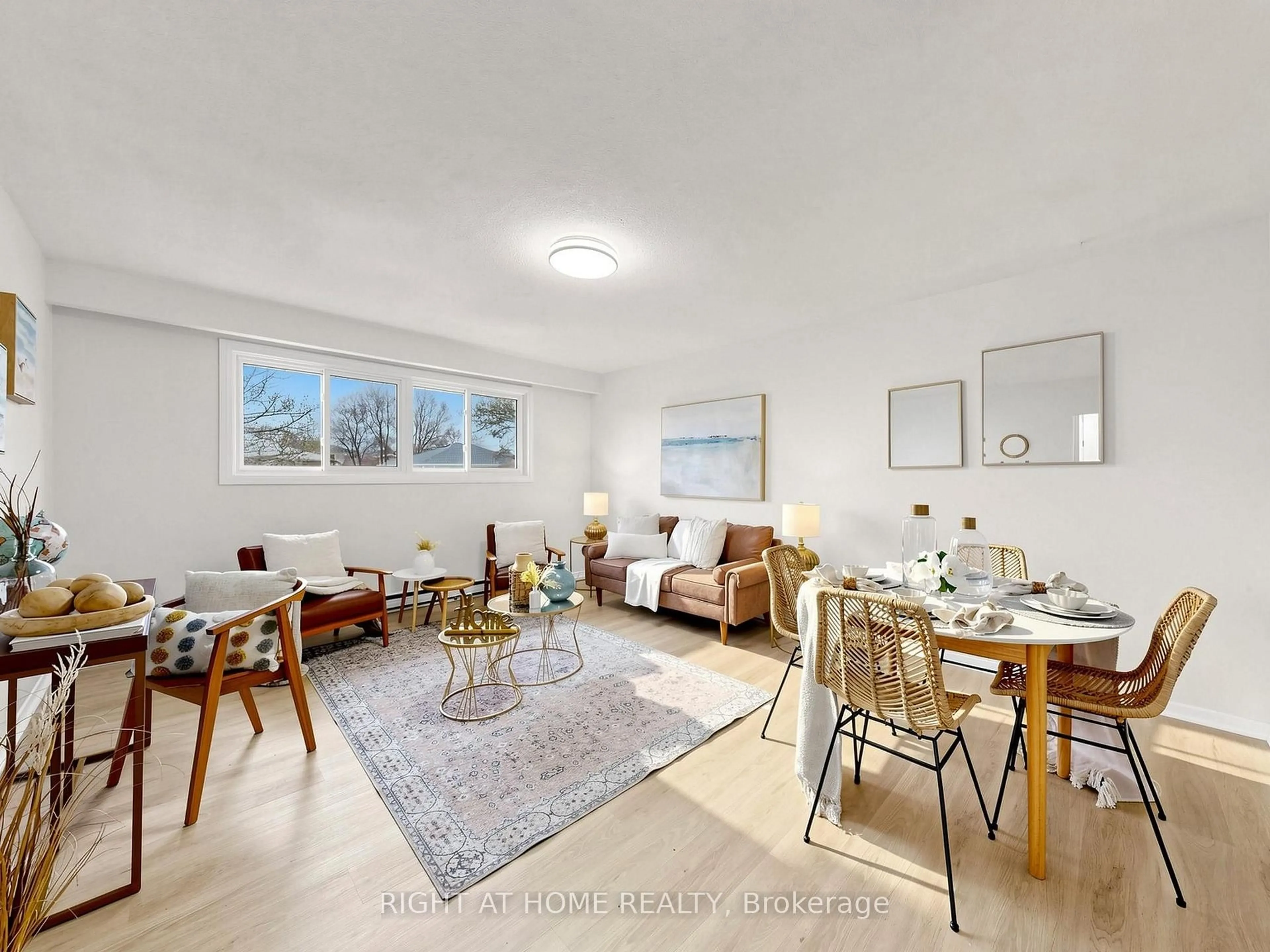 Living room with furniture, wood/laminate floor for 345 Dwight Ave, Oshawa Ontario L1J 1K8