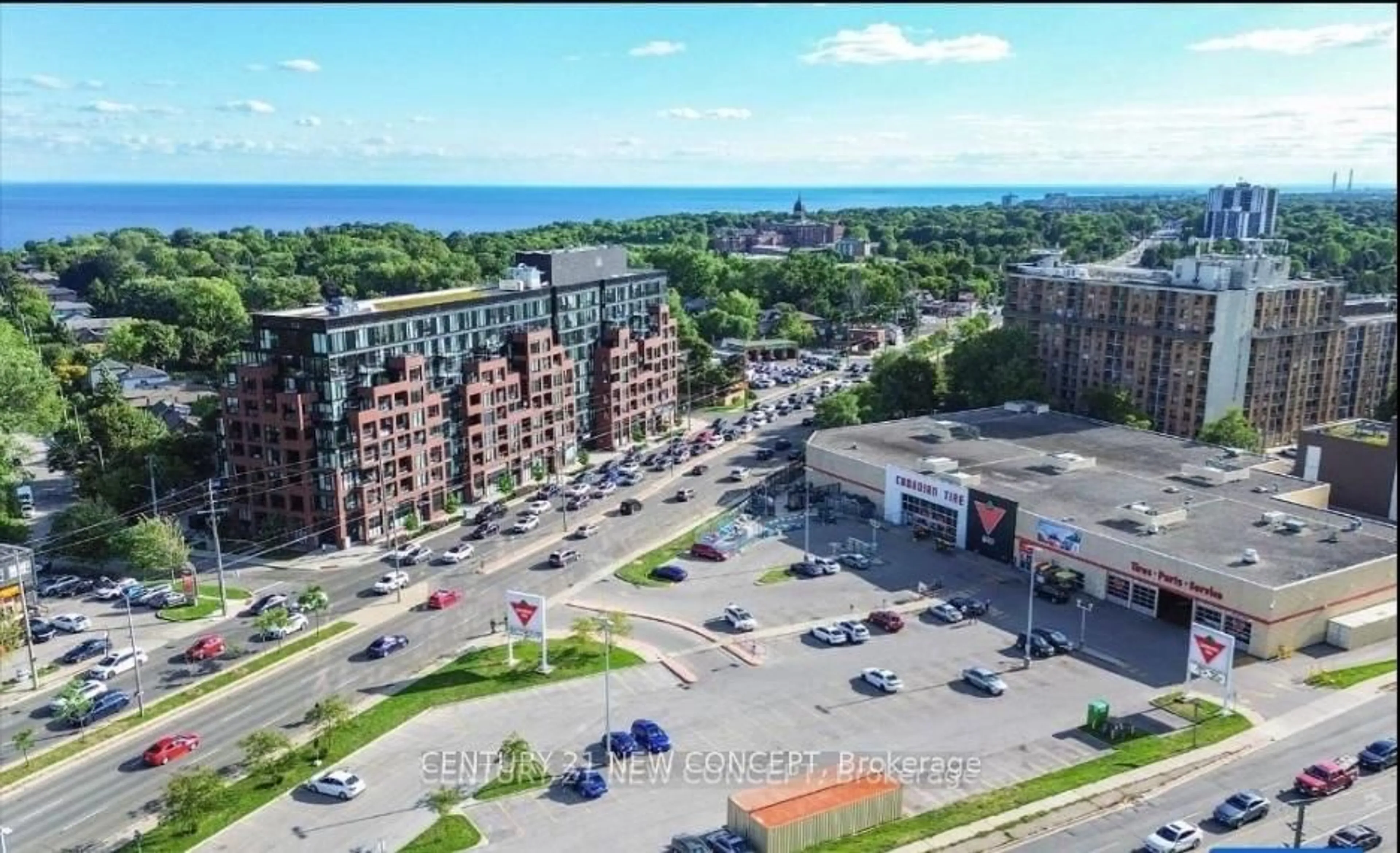 A pic from outside/outdoor area/front of a property/back of a property/a pic from drone, street for 2799 Kingston Rd #301, Toronto Ontario M1M 0E3