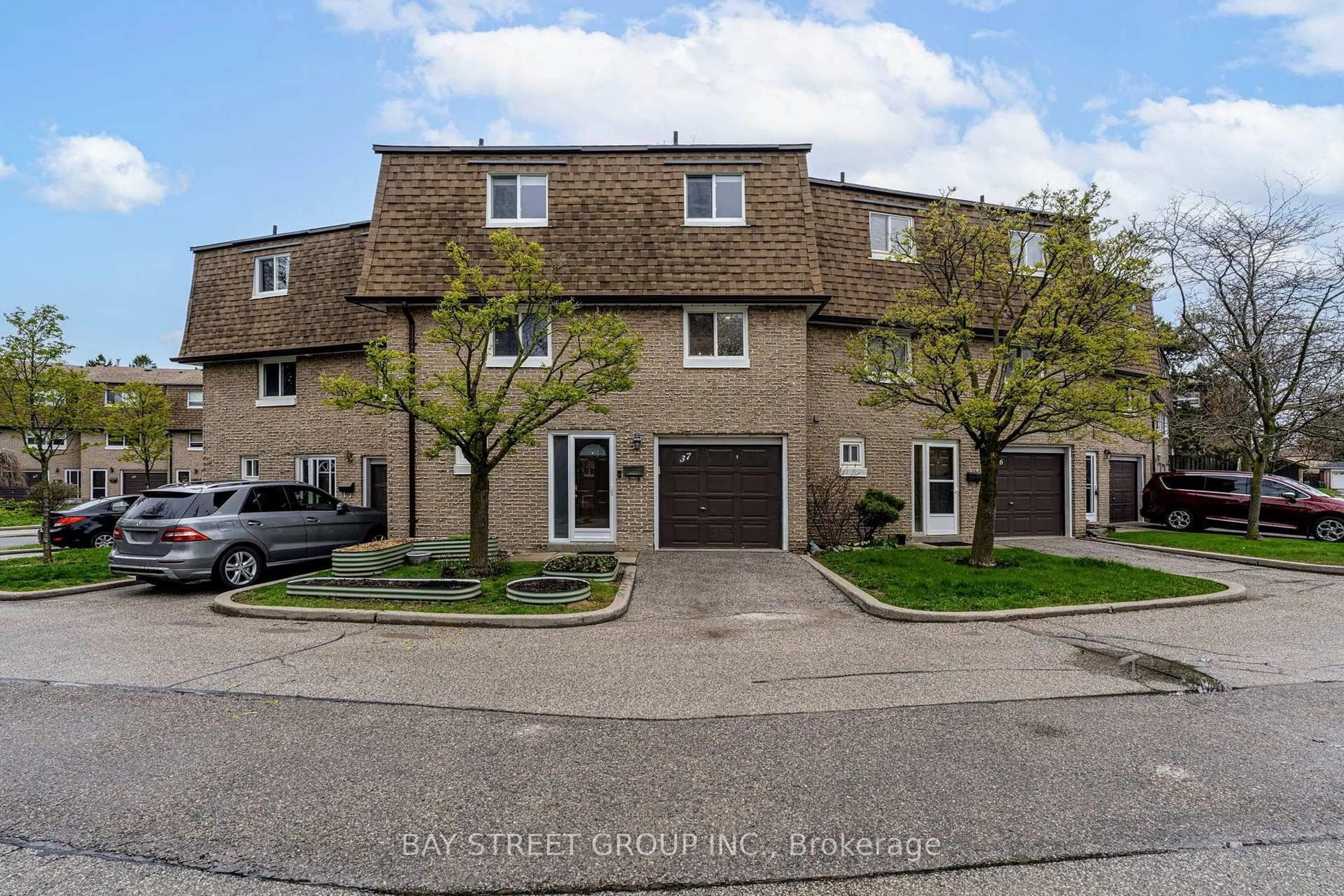A pic from outside/outdoor area/front of a property/back of a property/a pic from drone, street for 671 Huntingwood Dr #37, Toronto Ontario M1W 1H6