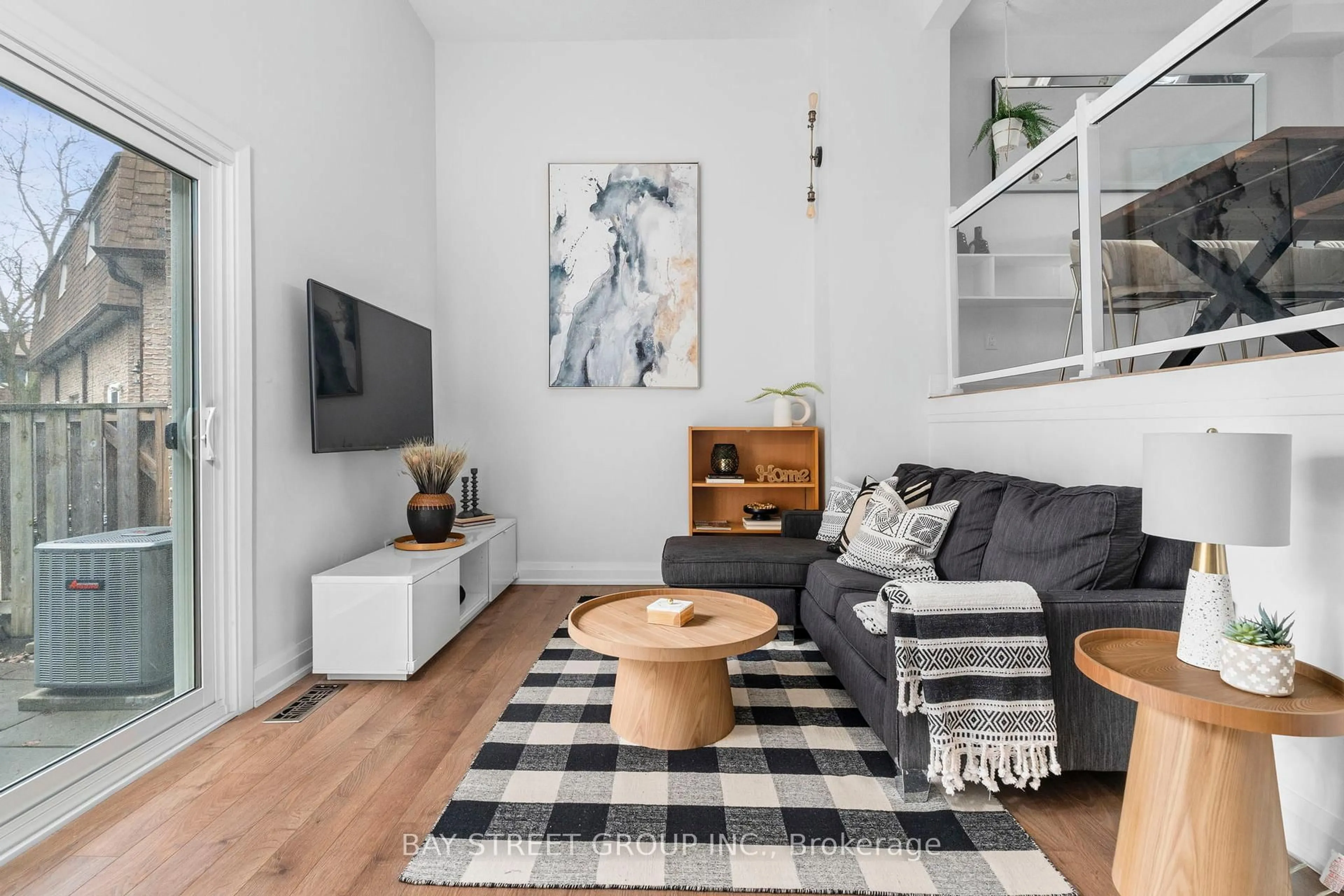 Living room with furniture, unknown for 671 Huntingwood Dr #37, Toronto Ontario M1W 1H6