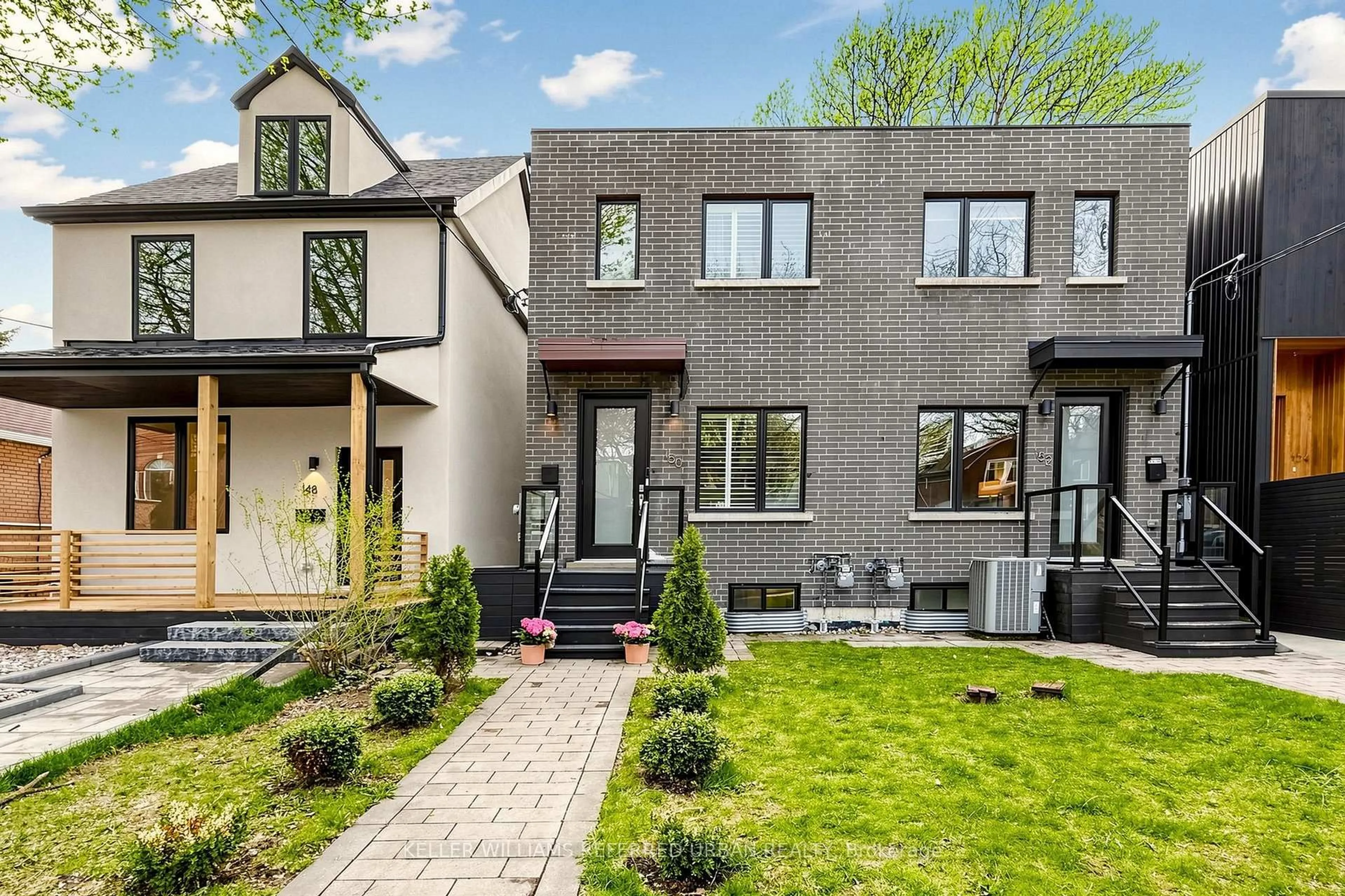 Home with brick exterior material, street for 150 Rhodes Ave, Toronto Ontario M4L 3A1