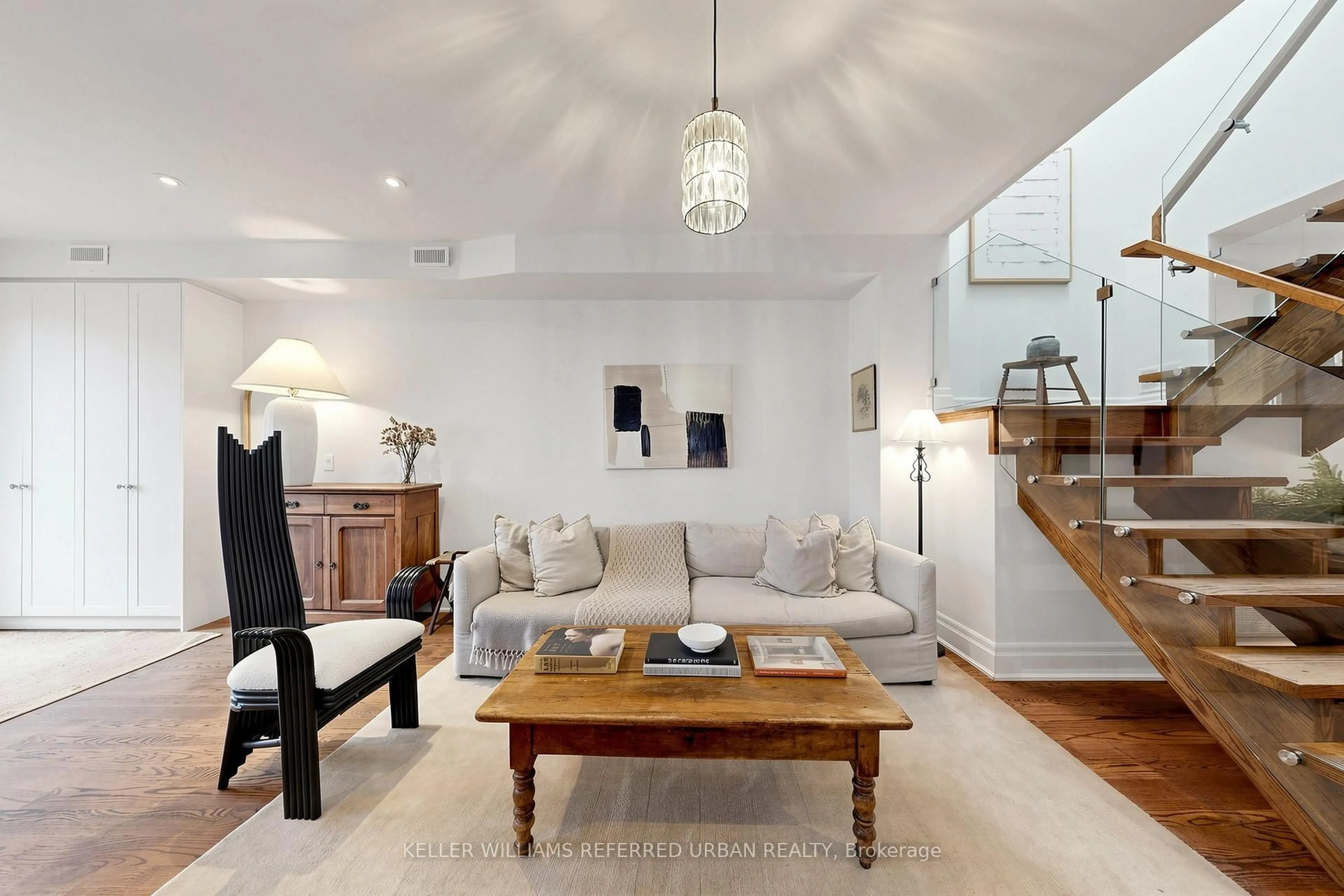 Living room with furniture, unknown for 150 Rhodes Ave, Toronto Ontario M4L 3A1