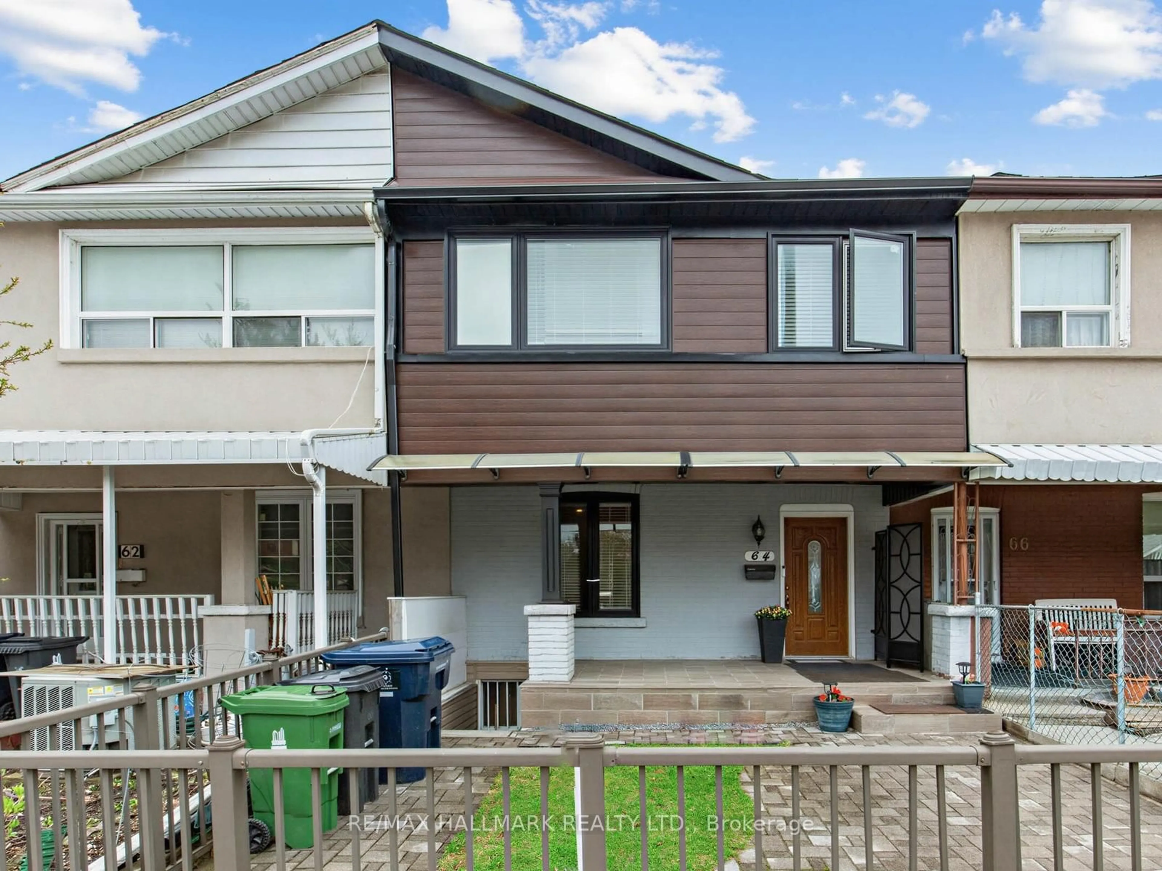 Home with vinyl exterior material, street for 64 Donlands Ave, Toronto Ontario M4J 3N8