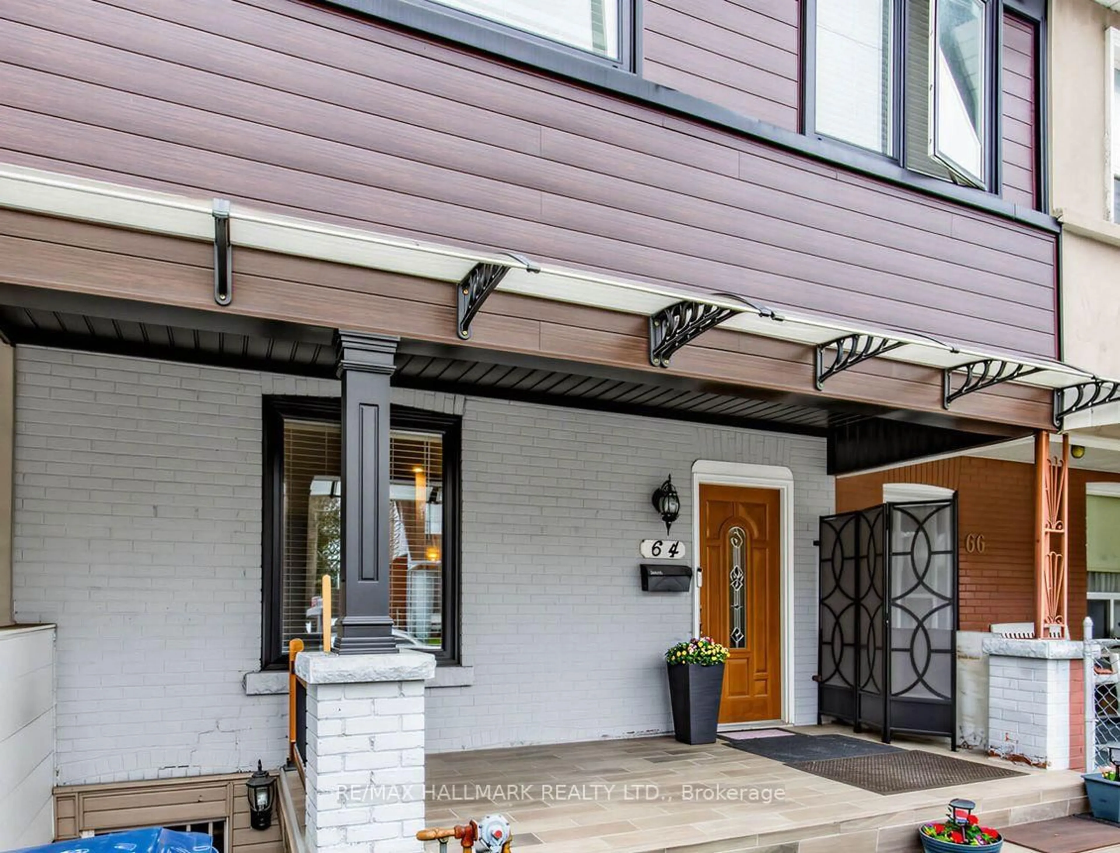 Home with brick exterior material, street for 64 Donlands Ave, Toronto Ontario M4J 3N8