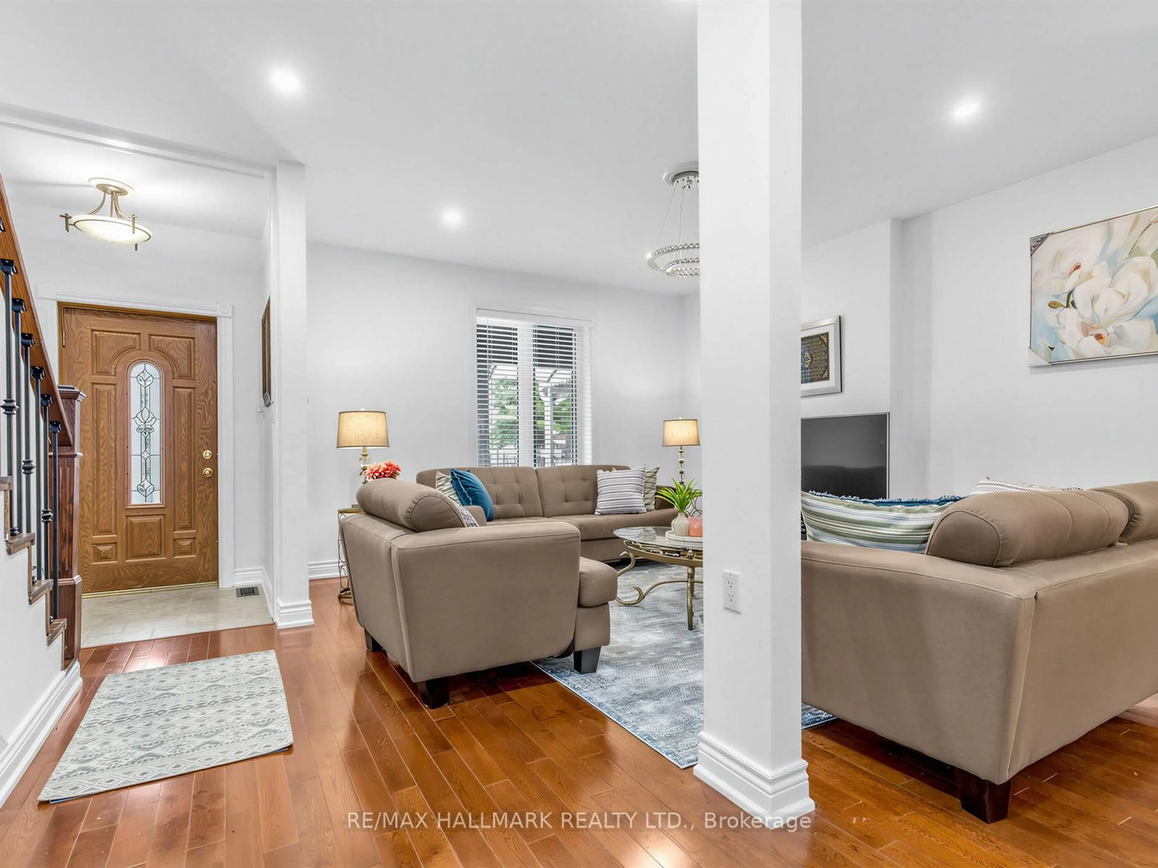 Living room with furniture, unknown for 64 Donlands Ave, Toronto Ontario M4J 3N8