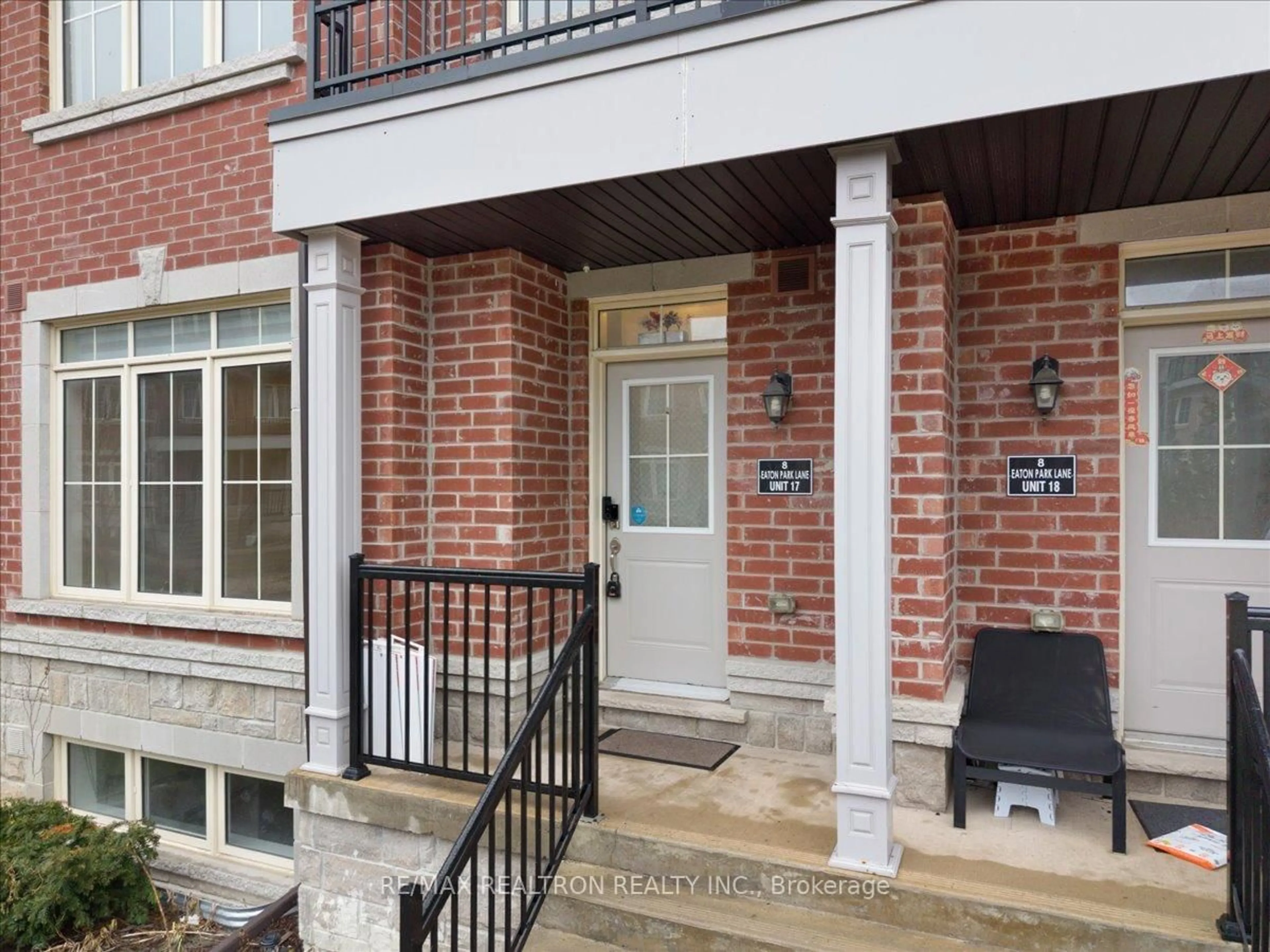 Home with brick exterior material, street for 8 Eaton Park Lane #17, Toronto Ontario M1W 0A5