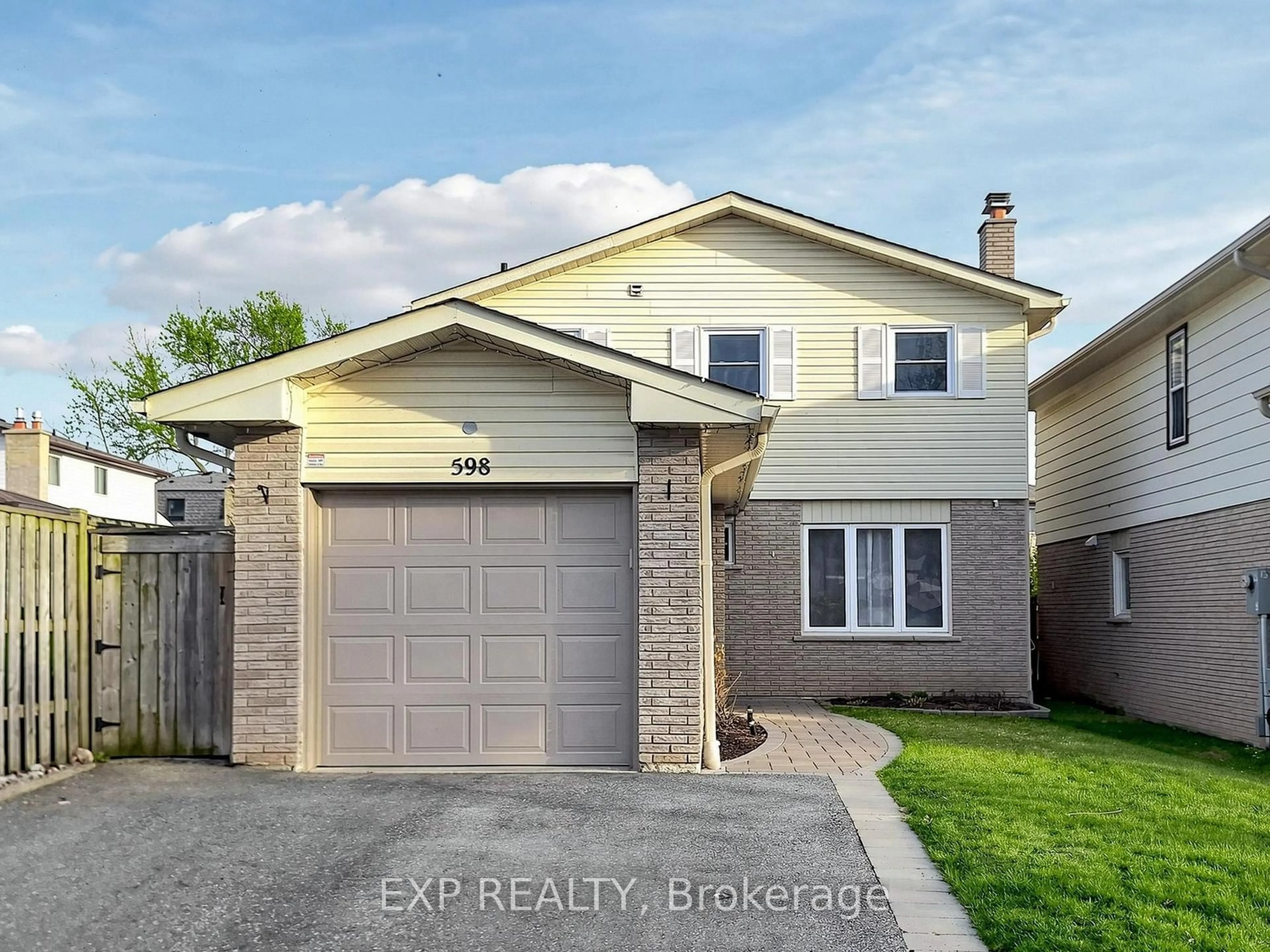 Home with vinyl exterior material, street for 598 Stonebridge Lane, Pickering Ontario L1W 3B3