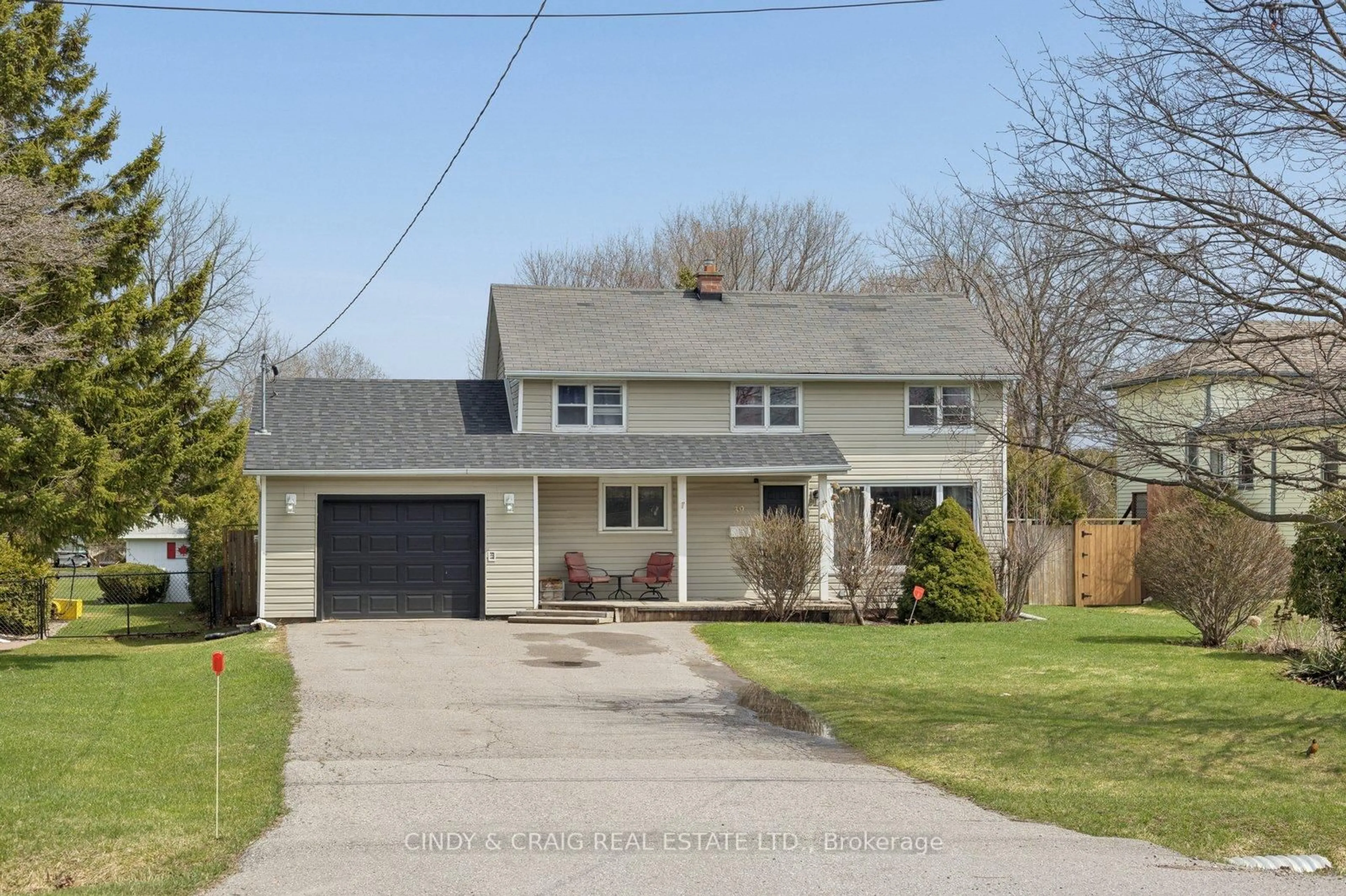 Home with vinyl exterior material, street for 39 Darlington Blvd, Clarington Ontario L1E 2J8