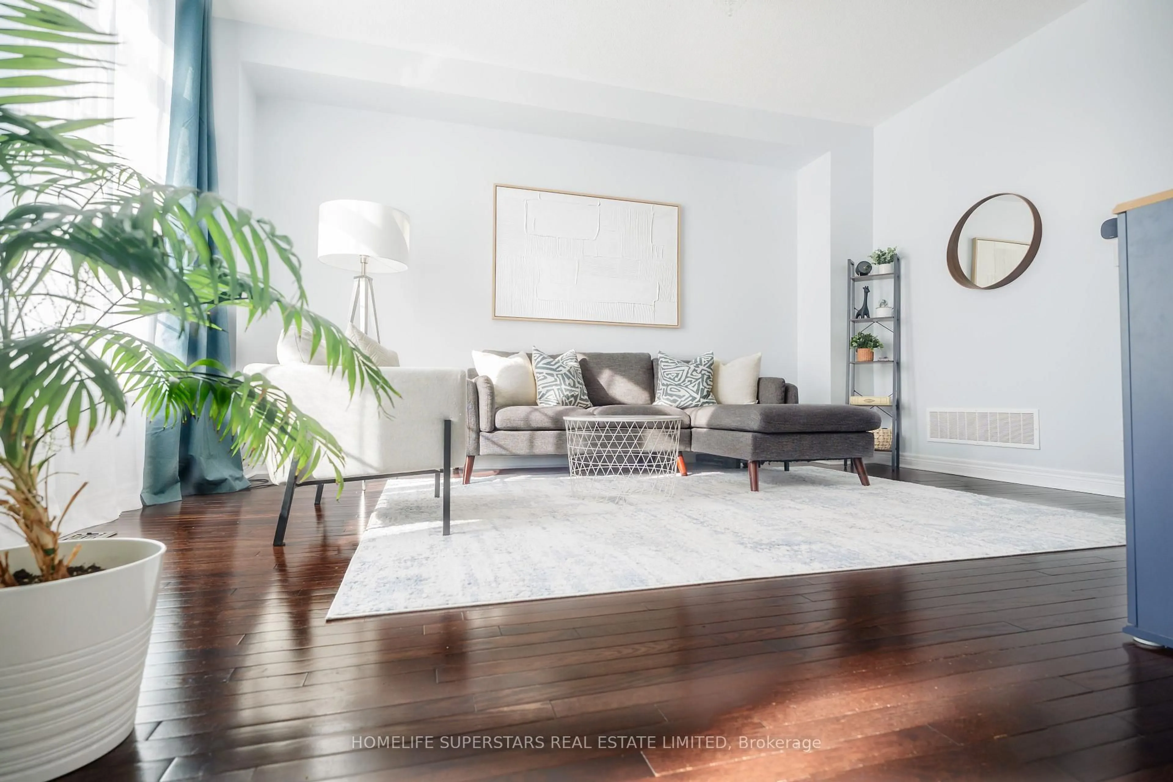 Living room with furniture, wood/laminate floor for 2555 Canadian St, Pickering Ontario L1X 0C7