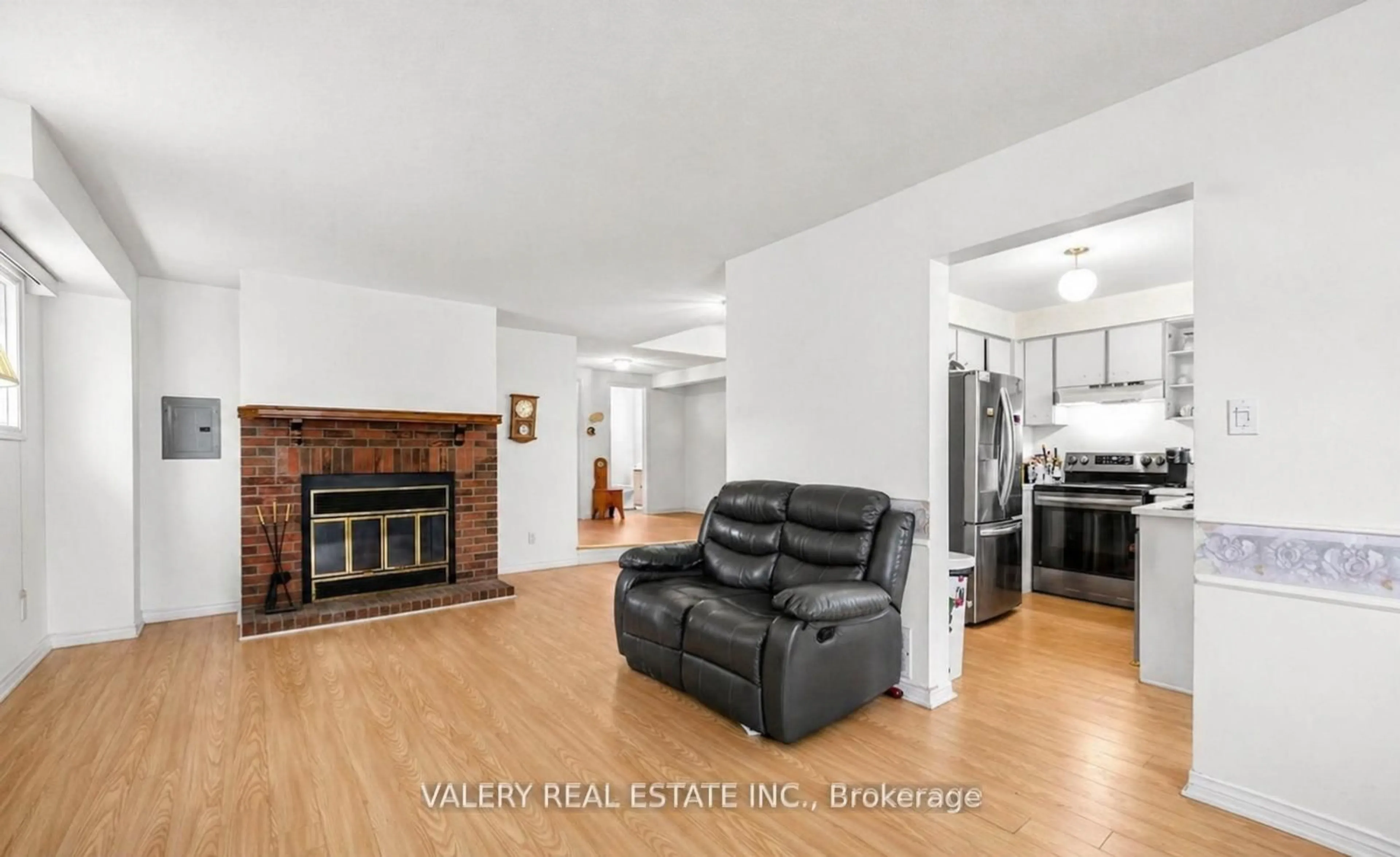Living room with furniture, wood/laminate floor for 1610 Rawlings Dr, Pickering Ontario L1V 5B5