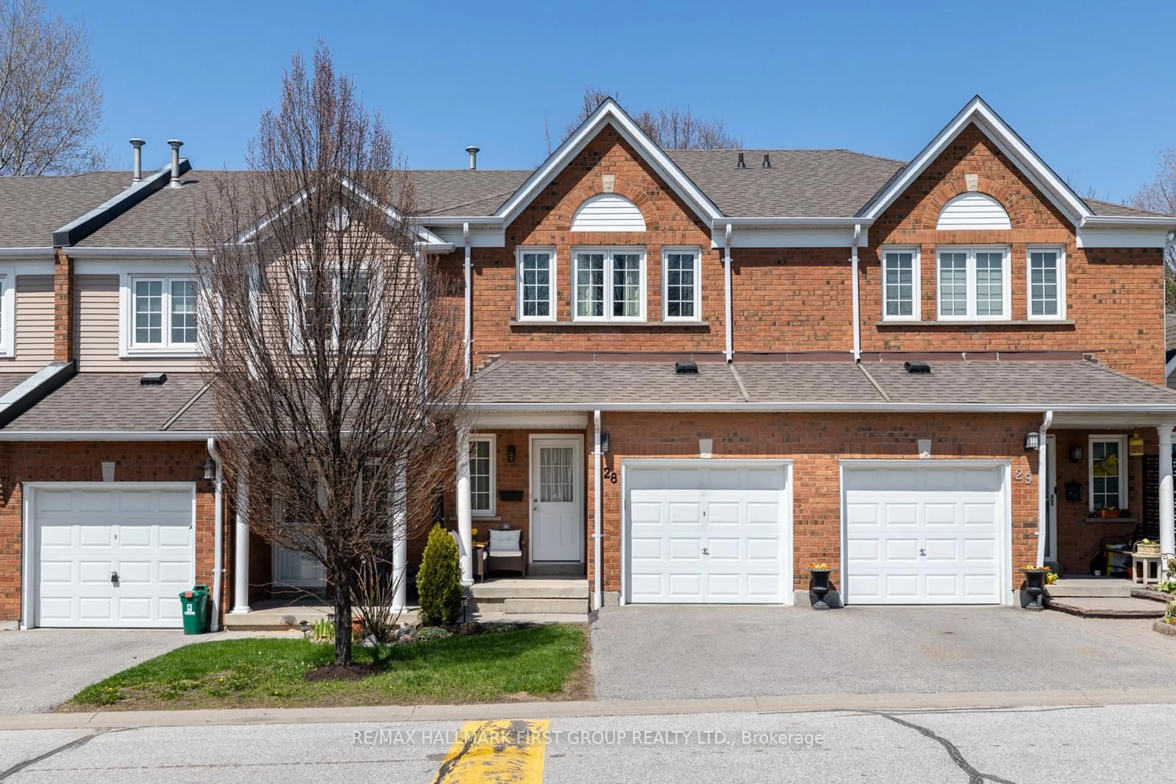 Home with brick exterior material, street for 10 Bassett Blvd #28, Whitby Ontario L1N 9C3