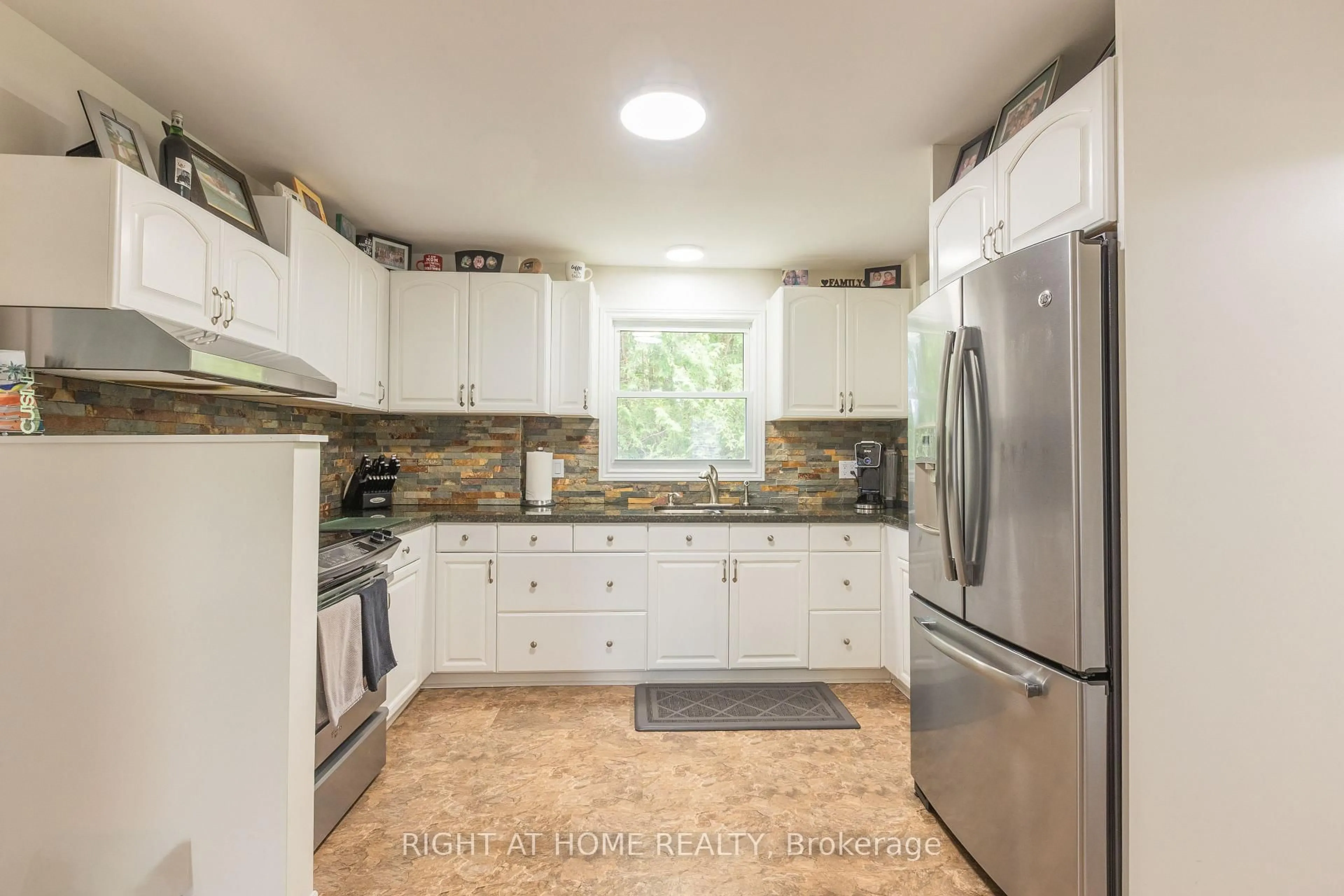 Open concept kitchen, ceramic/tile floor for 18 Duke St, Clarington Ontario L1C 2T8
