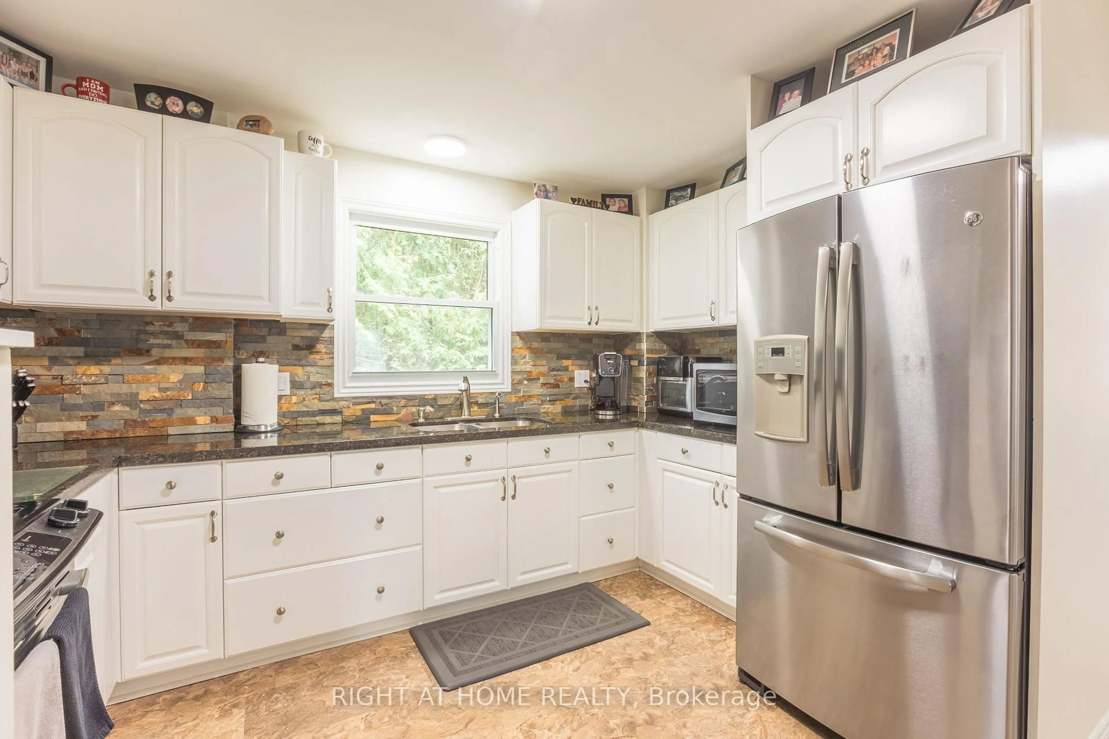 Open concept kitchen, ceramic/tile floor for 18 Duke St, Clarington Ontario L1C 2T8