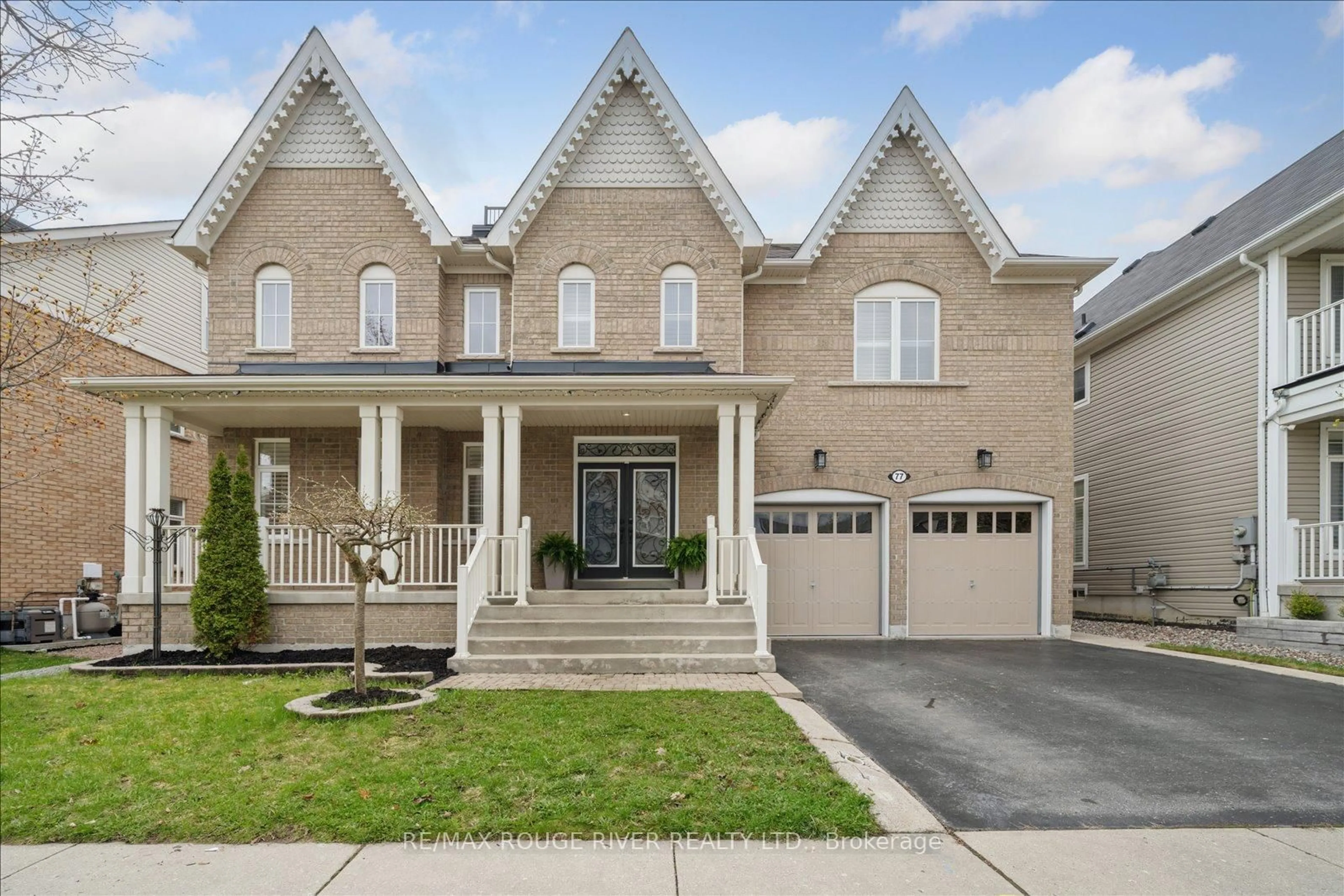 Home with brick exterior material, street for 77 Joshua Blvd, Whitby Ontario L1M 0J2