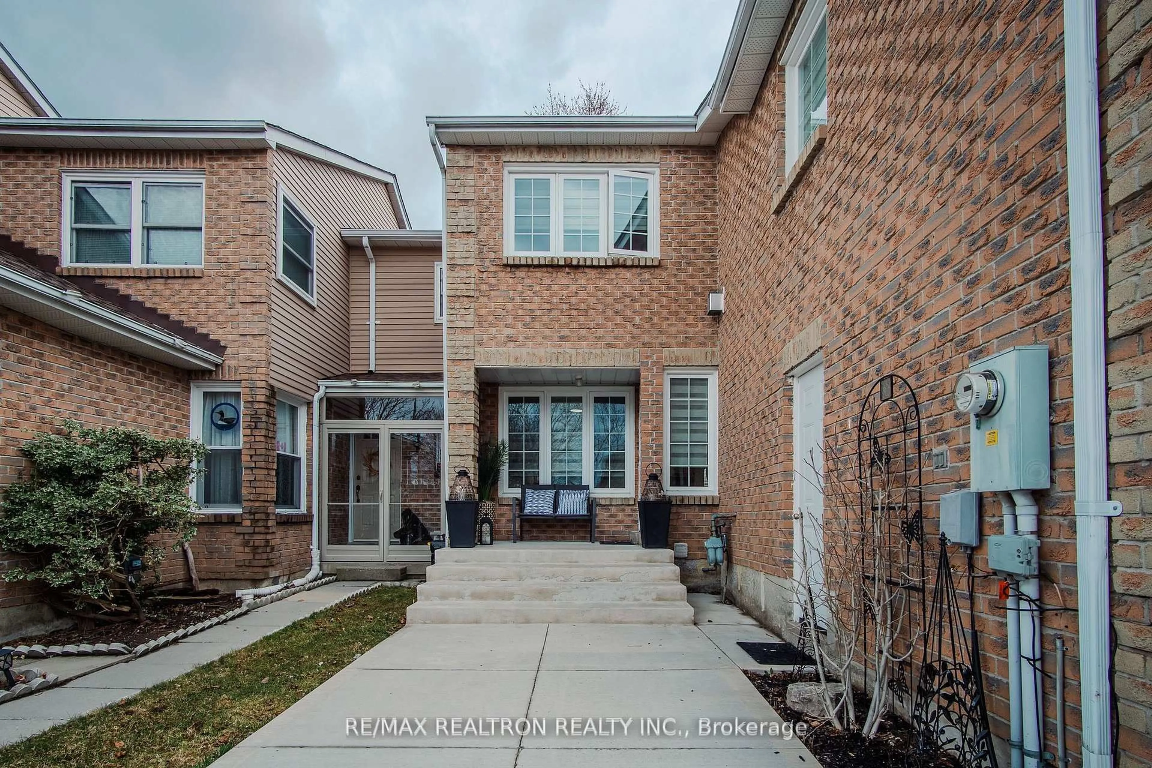 Home with brick exterior material, street for 1039 Rowntree Cres, Pickering Ontario L1V 5A9