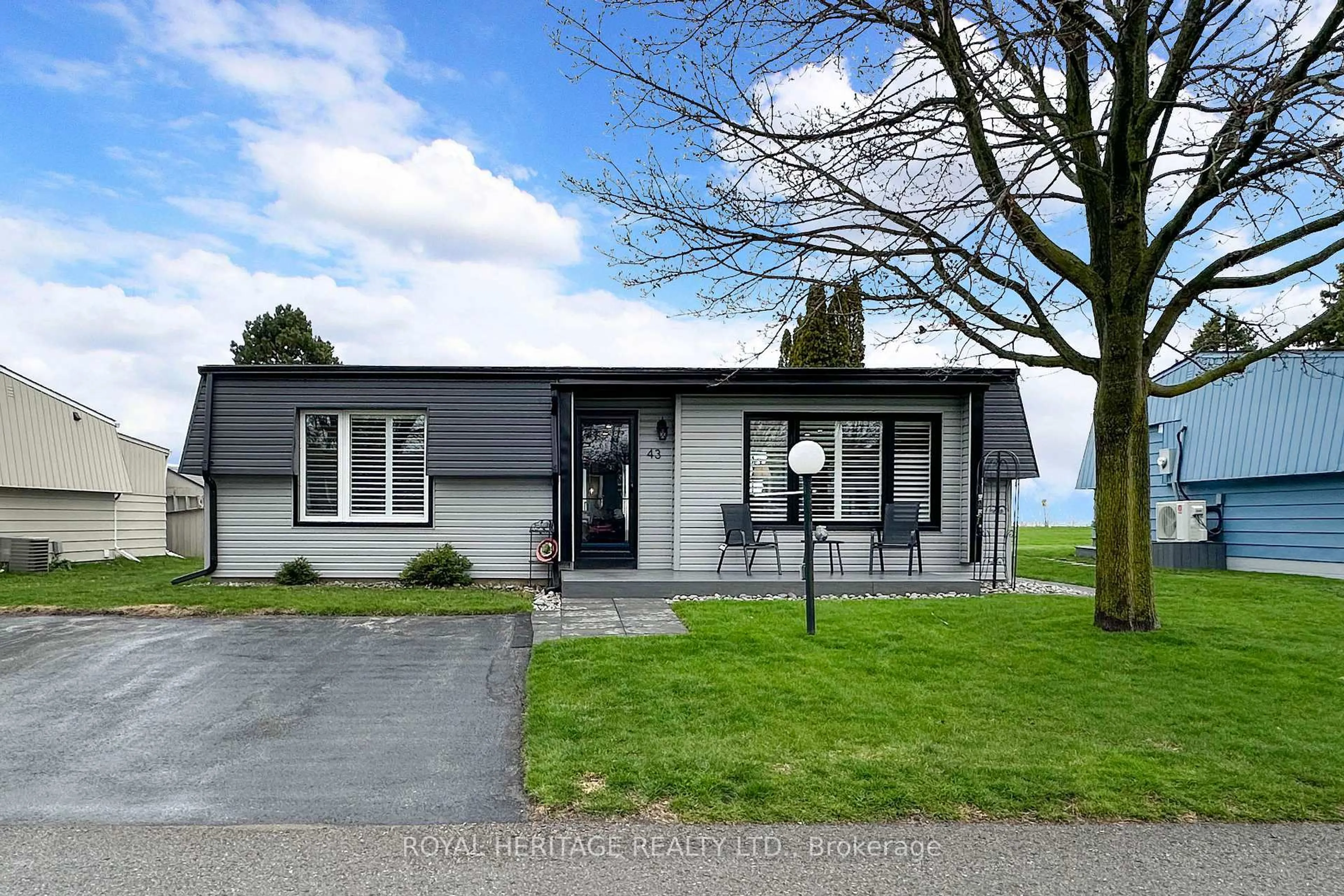 Home with vinyl exterior material, street for 43 Bluffs Rd, Clarington Ontario L1B 1A4