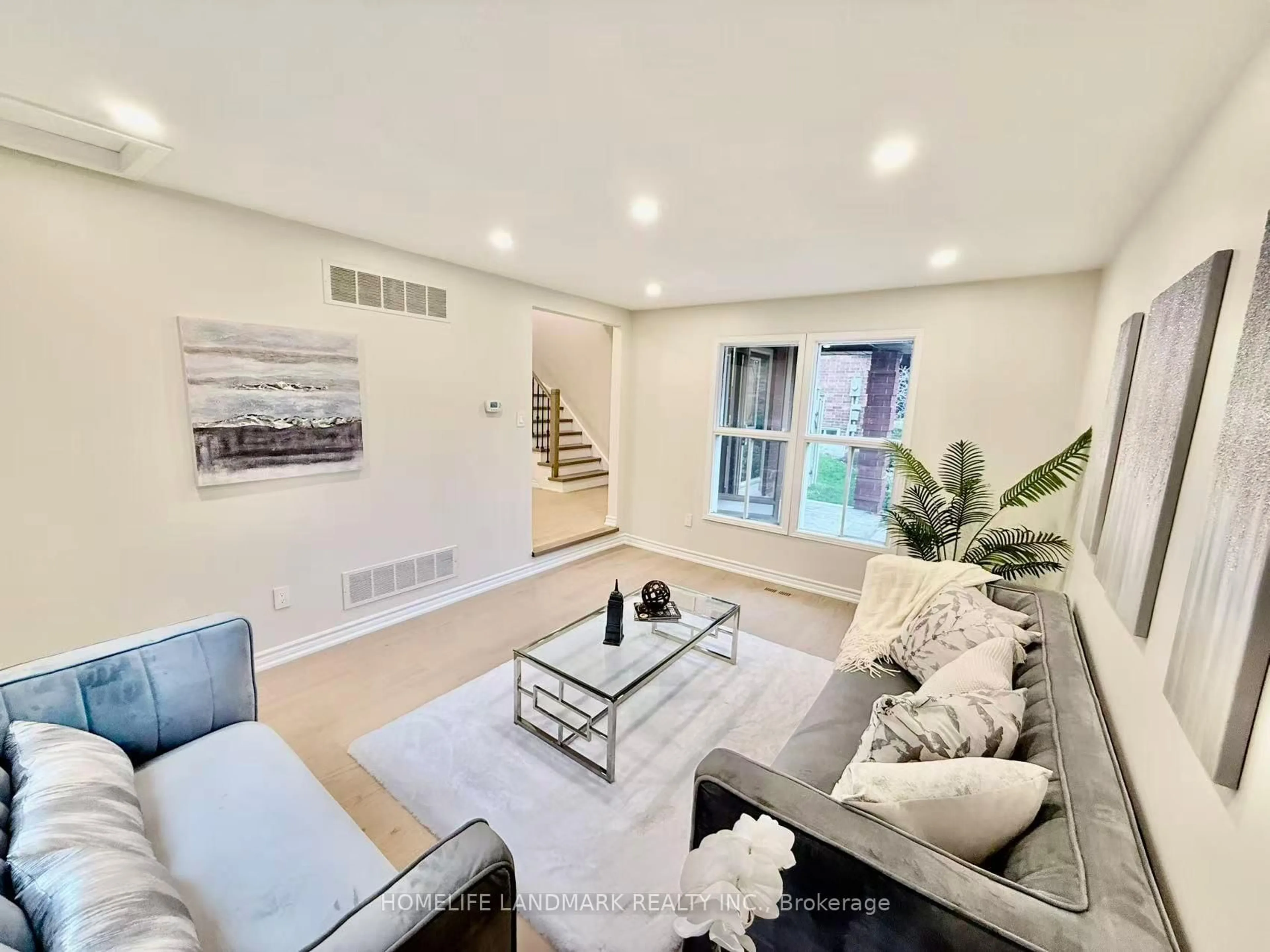 Living room with furniture, unknown for 23 Coulton Crt, Whitby Ontario L1N 7A9
