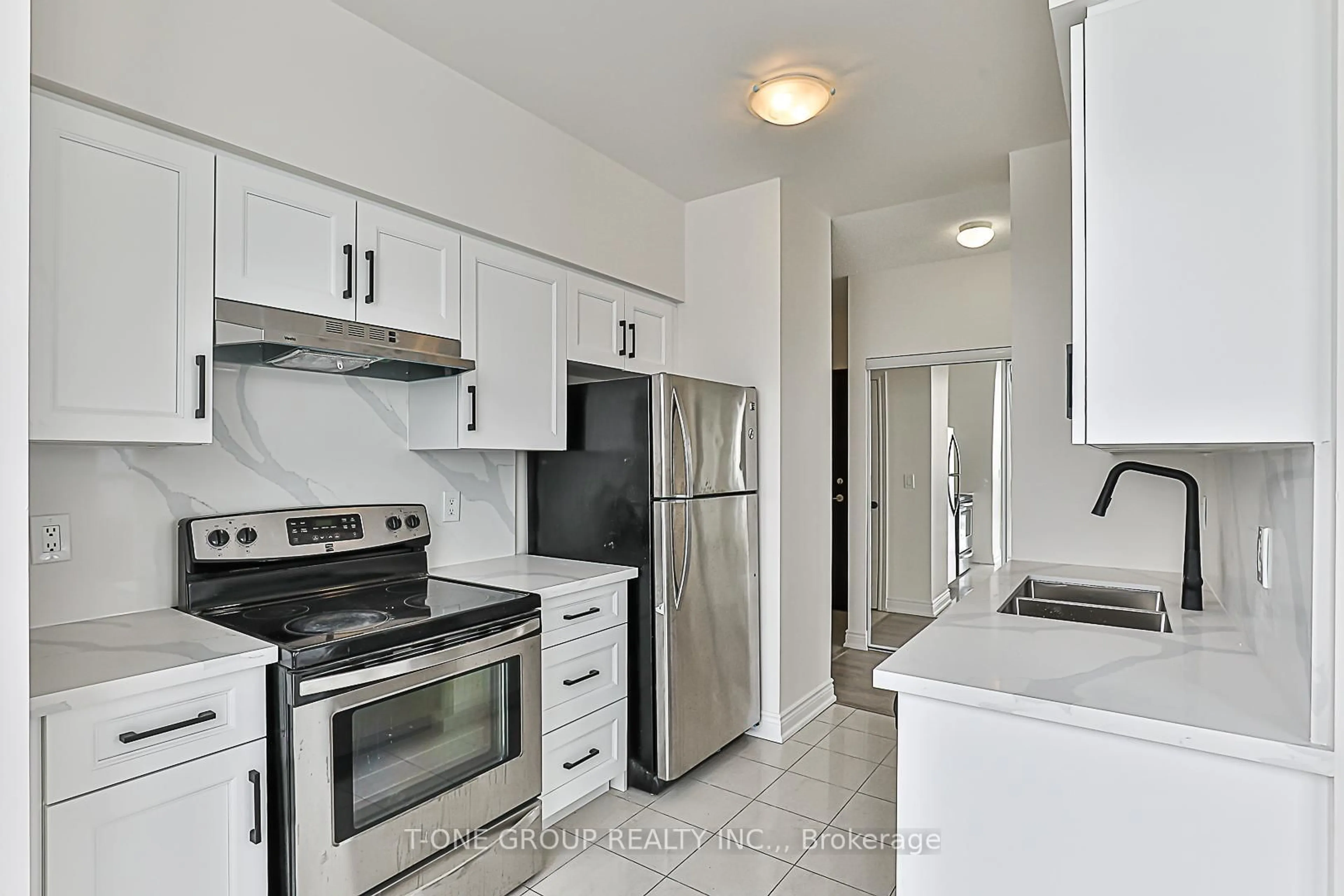 Standard kitchen, ceramic/tile floor for 50 Brian Harrison Way #Ph5-3803, Toronto Ontario M1P 5J4