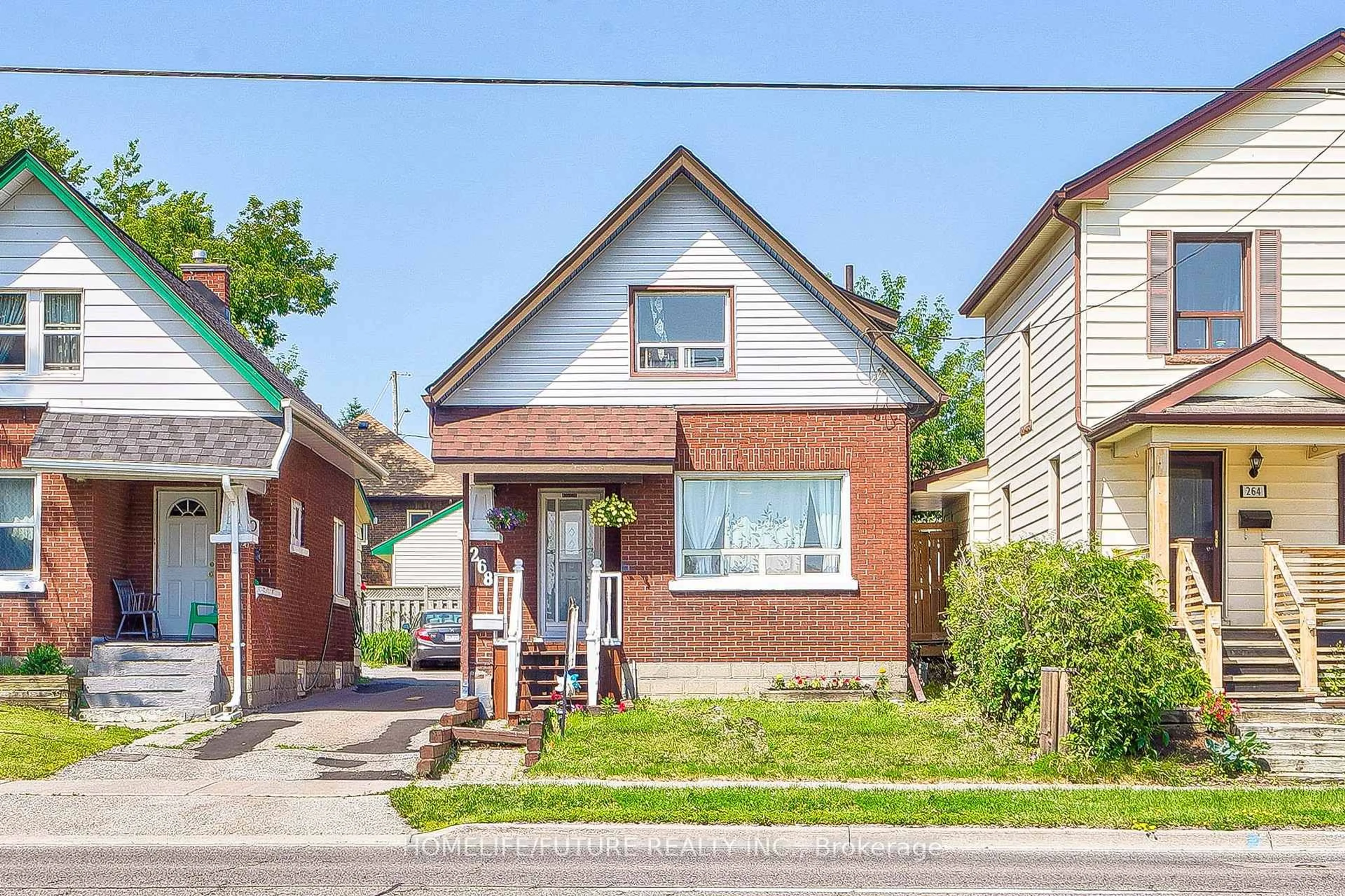 Home with brick exterior material, street for 268 Ritson Rd, Oshawa Ontario L1H 5J1