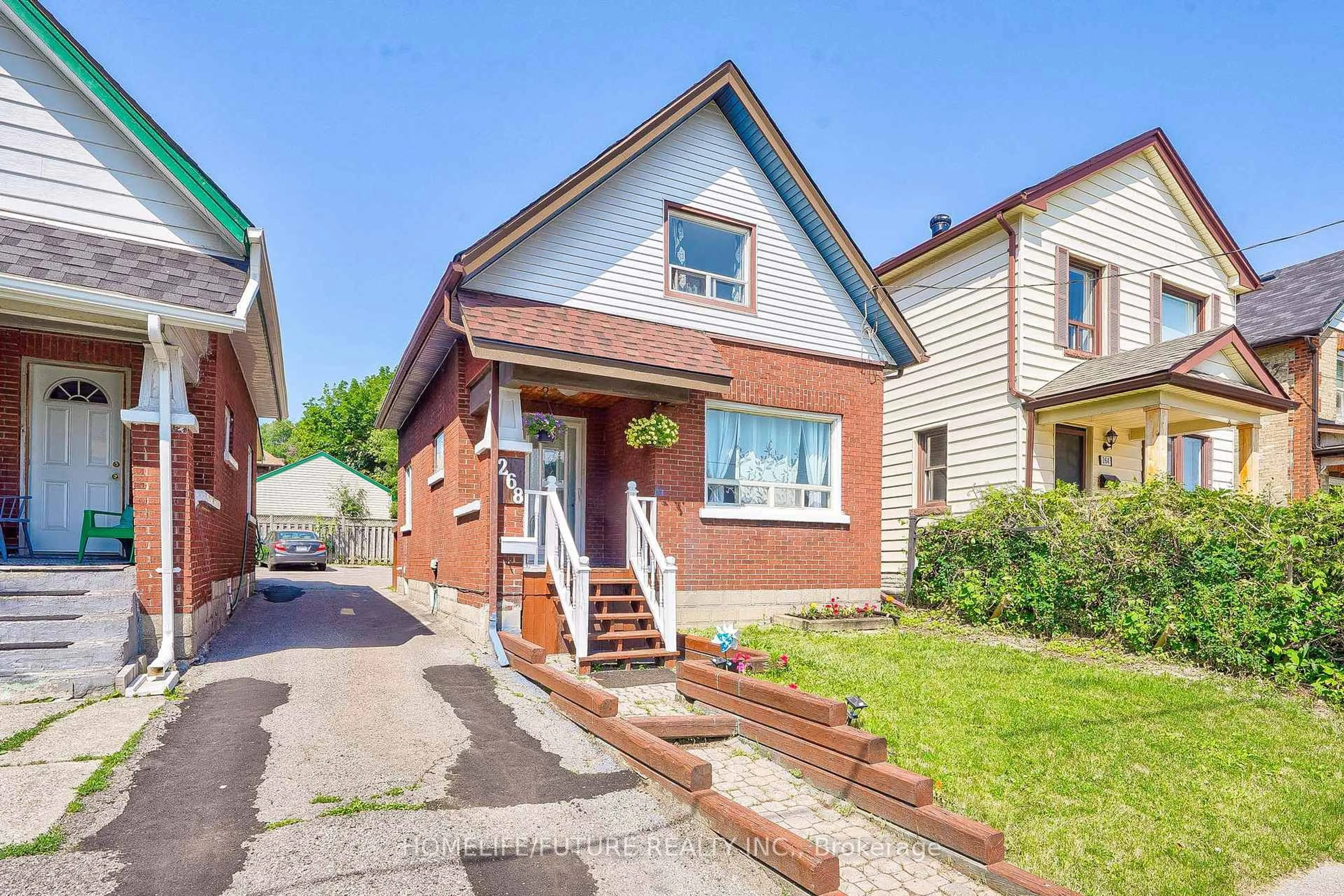 Home with brick exterior material, street for 268 Ritson Rd, Oshawa Ontario L1H 5J1
