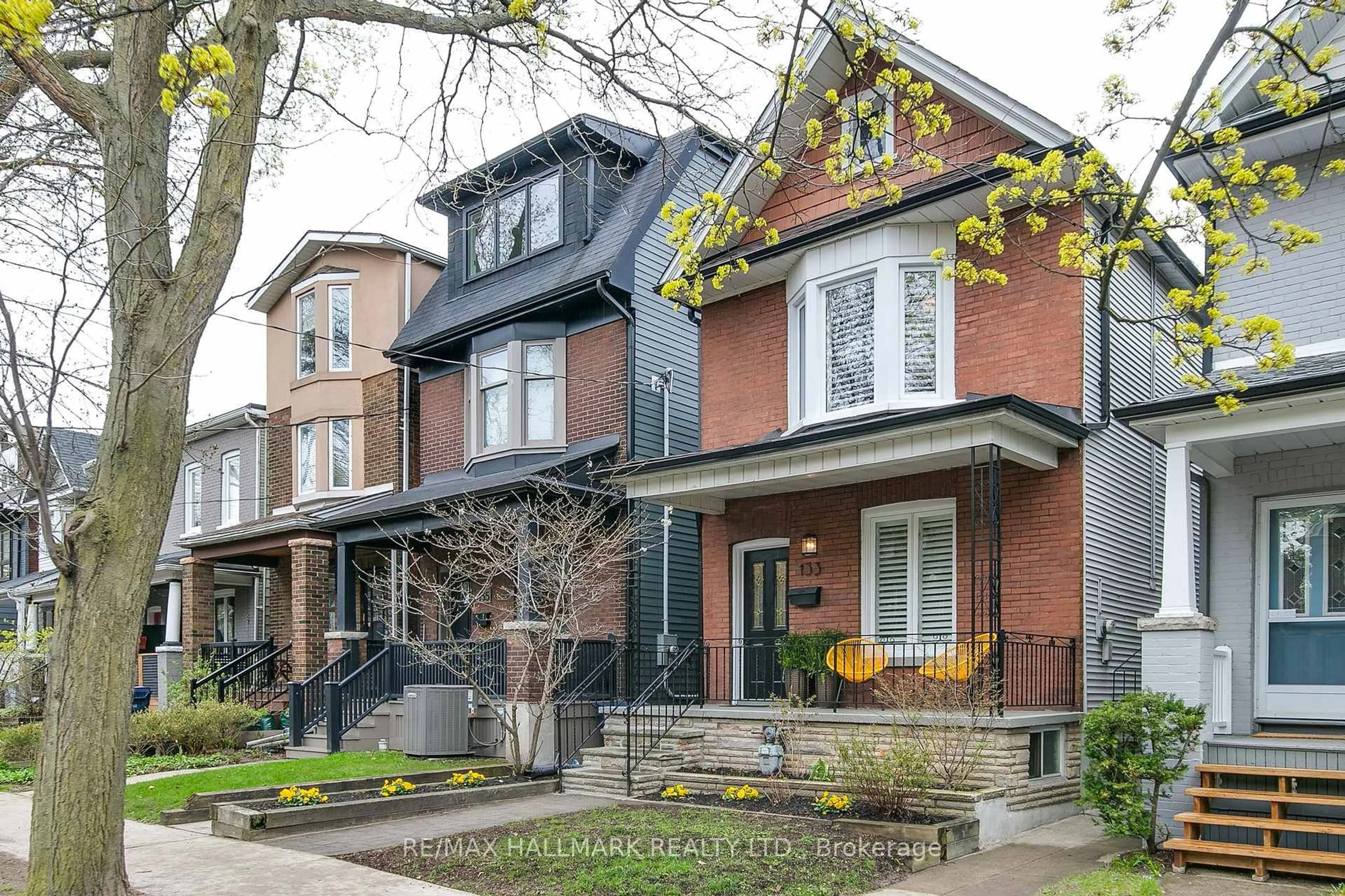 Home with brick exterior material, street for 133 Langford Ave, Toronto Ontario M4J 3E5
