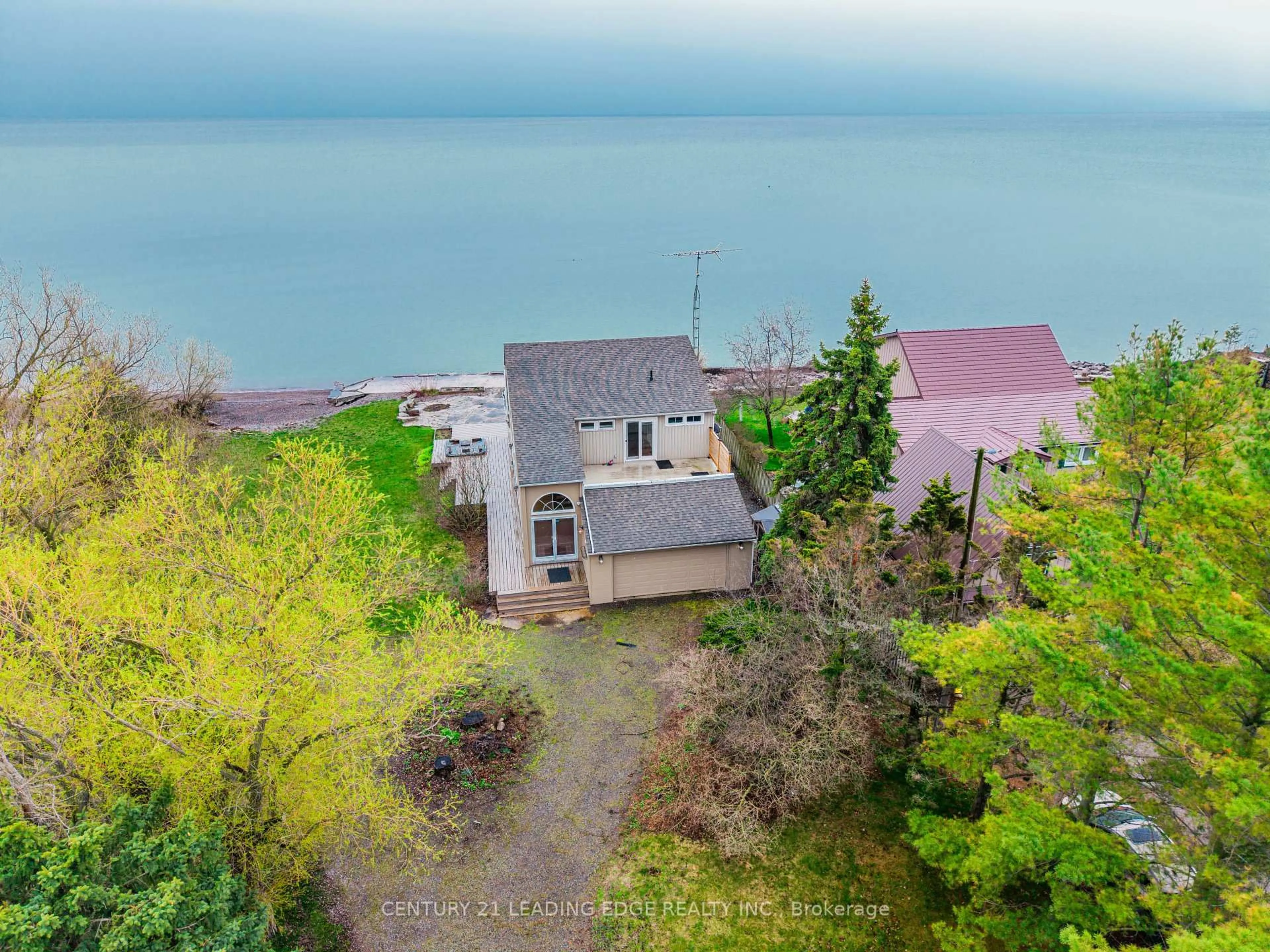 A pic from outside/outdoor area/front of a property/back of a property/a pic from drone, water/lake/river/ocean view for 151 Cedar Crest Beach Rd, Clarington Ontario L1C 5R2