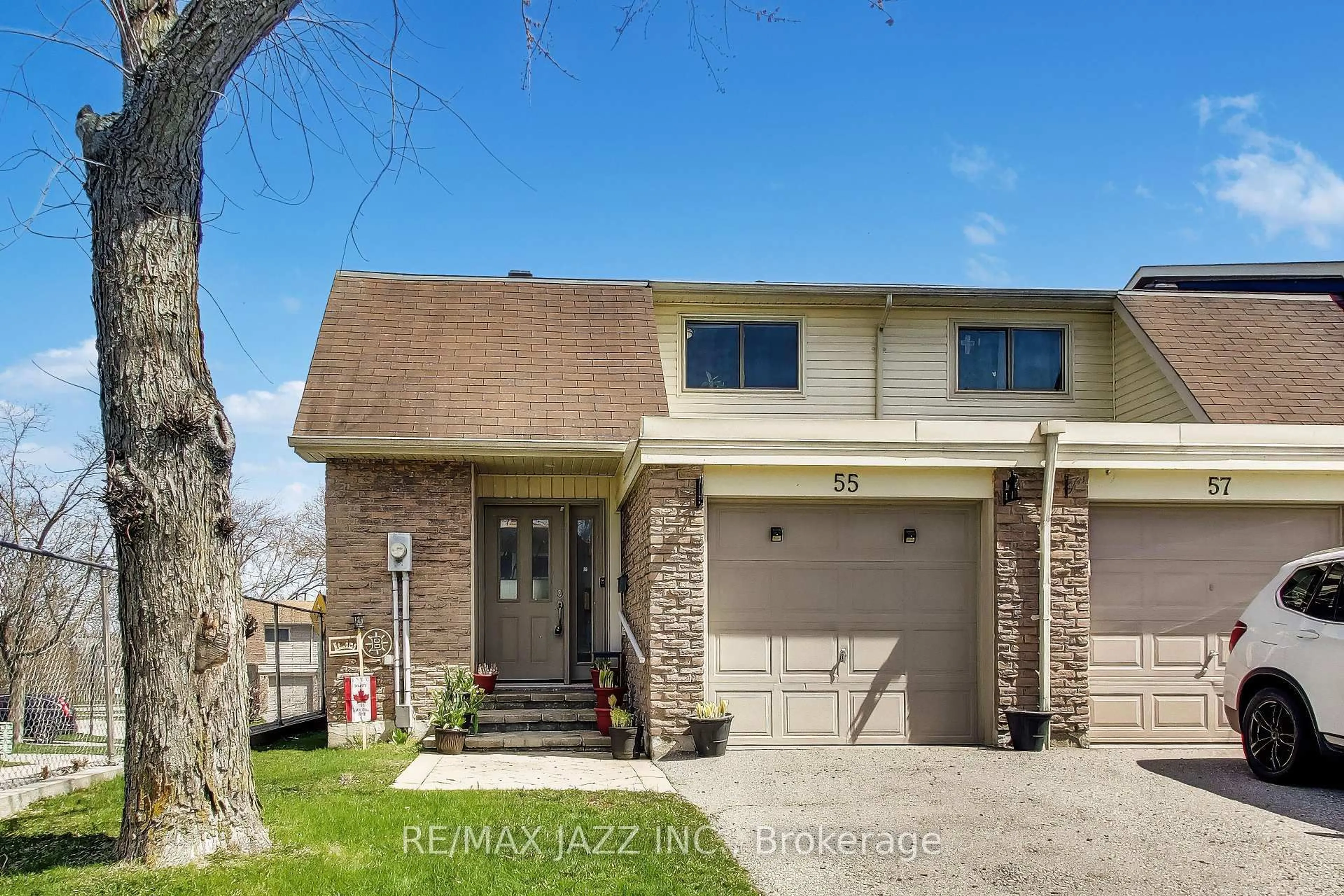 Home with brick exterior material, street for 55 Clover Ridge Dr, Ajax Ontario L1S 3M3