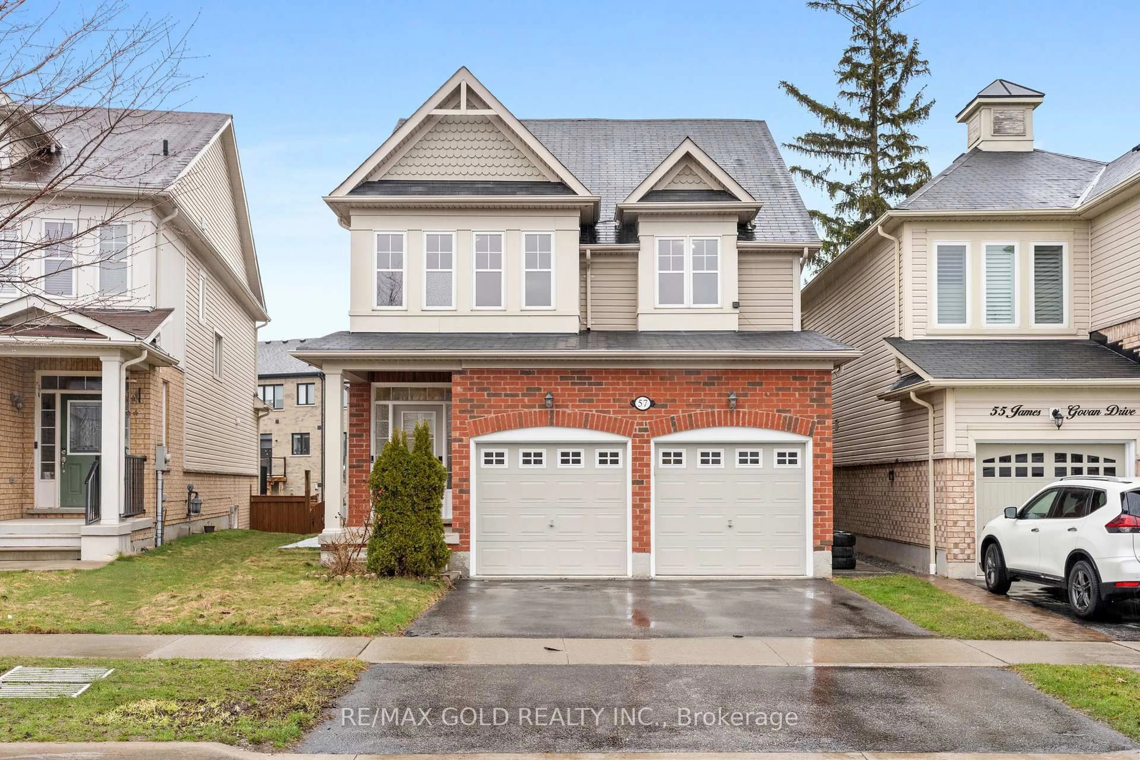 Home with brick exterior material, street for 57 James Govan Dr, Whitby Ontario L1N 0J9