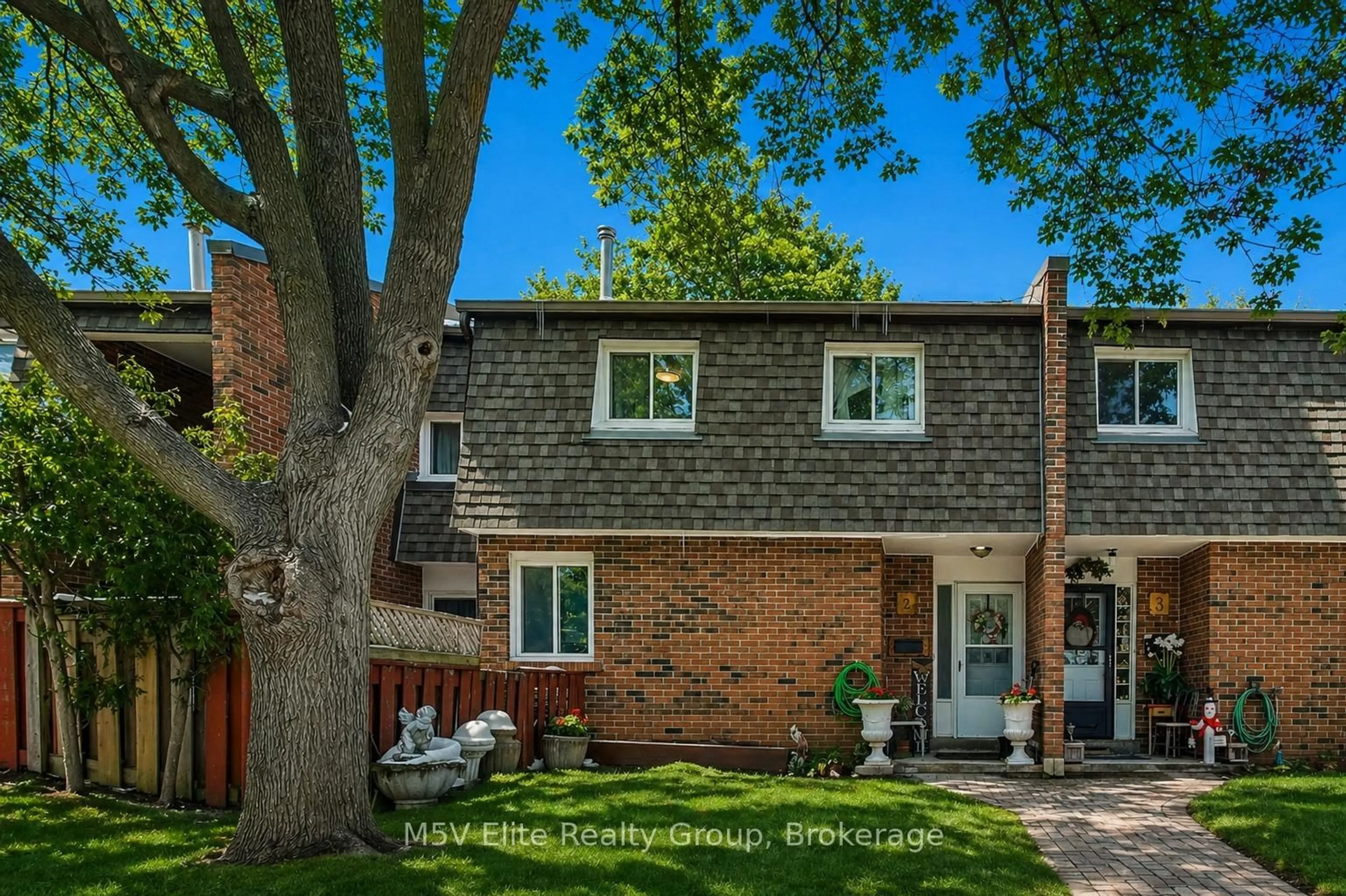 Home with brick exterior material, street for 105 Dovedale Dr #2, Whitby Ontario L1N 1Z7