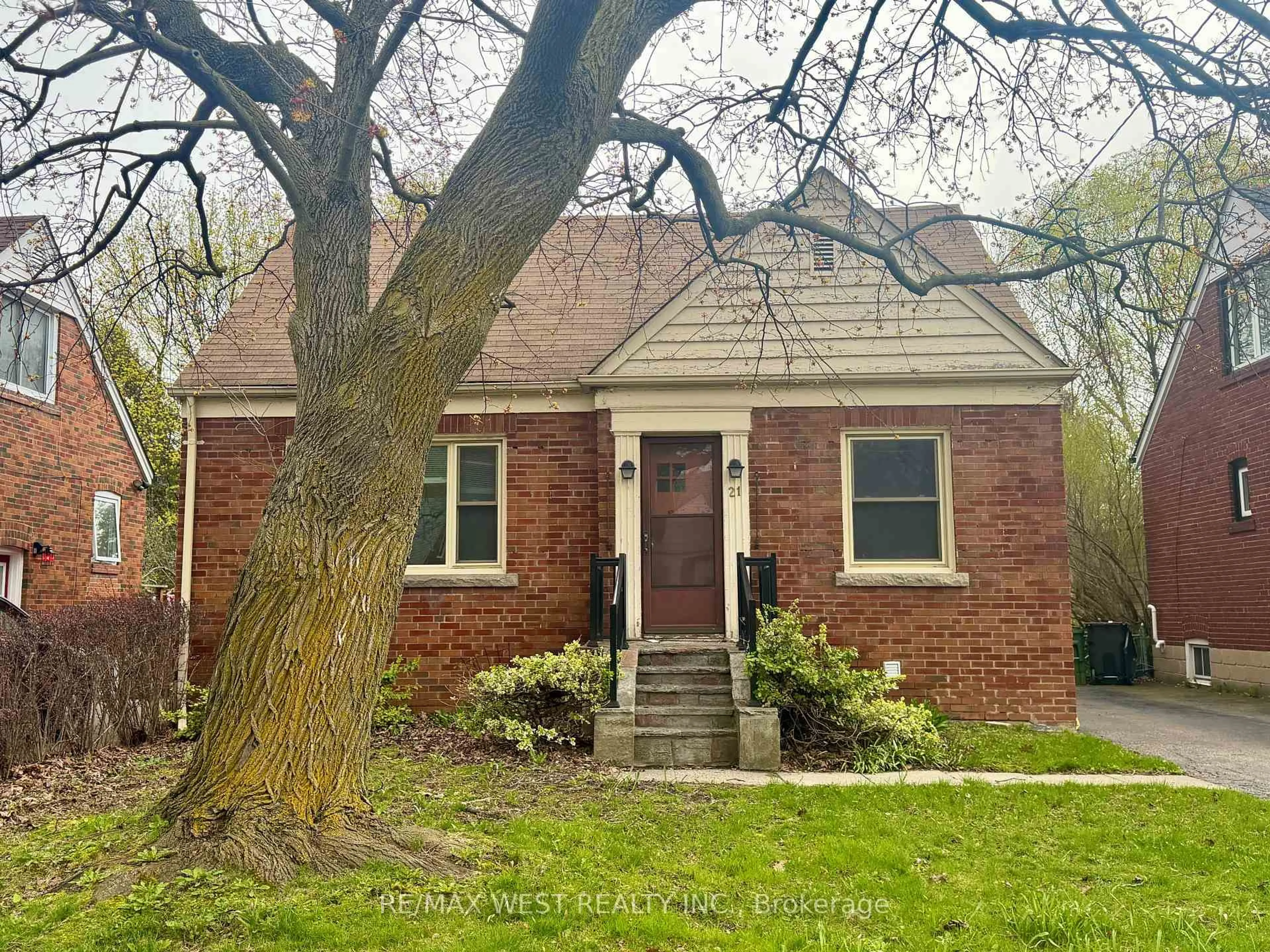 Home with brick exterior material, street for 21 Plaxton Dr, Toronto Ontario M4B 2P6
