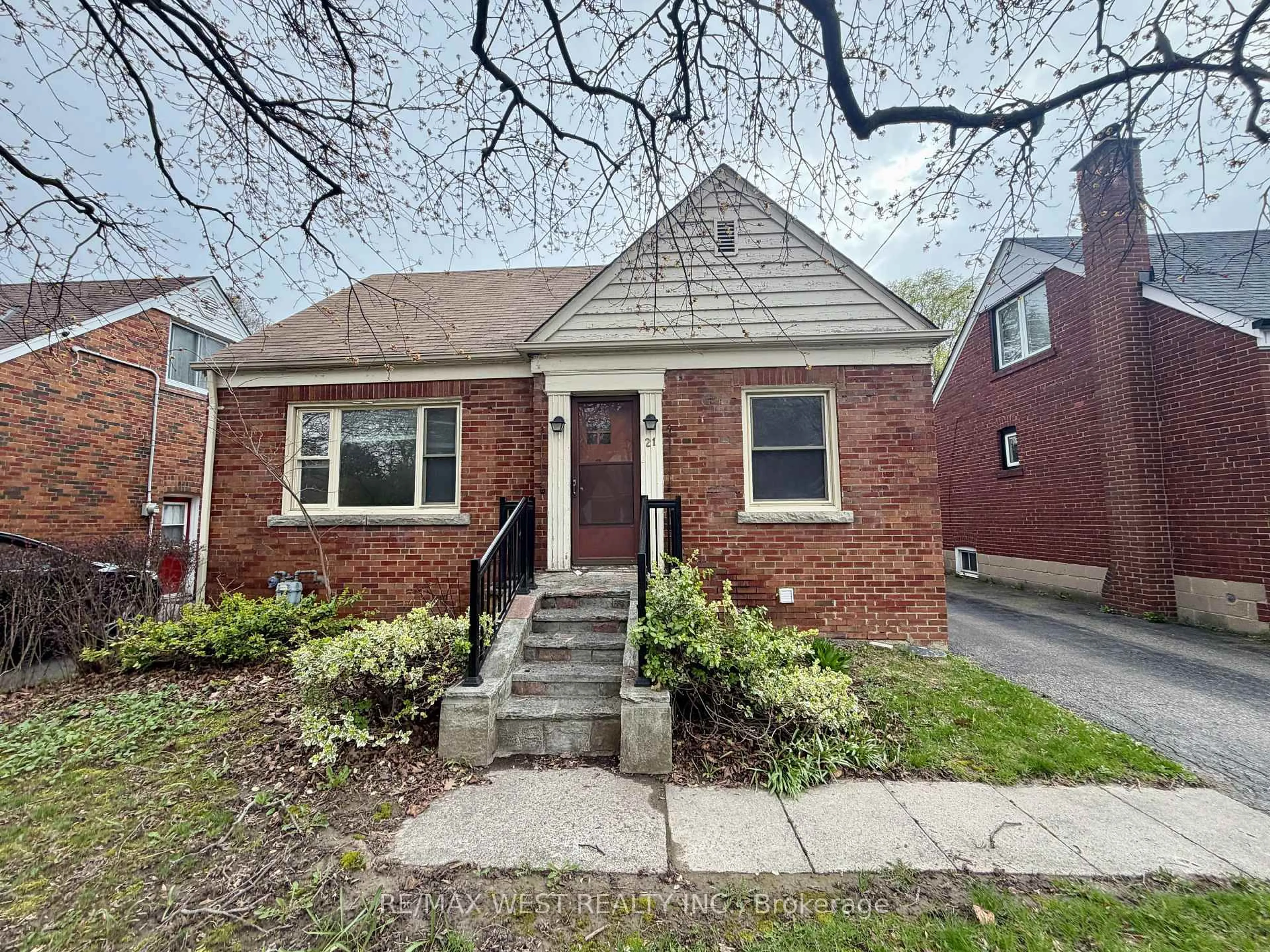 Home with brick exterior material, street for 21 Plaxton Dr, Toronto Ontario M4B 2P6