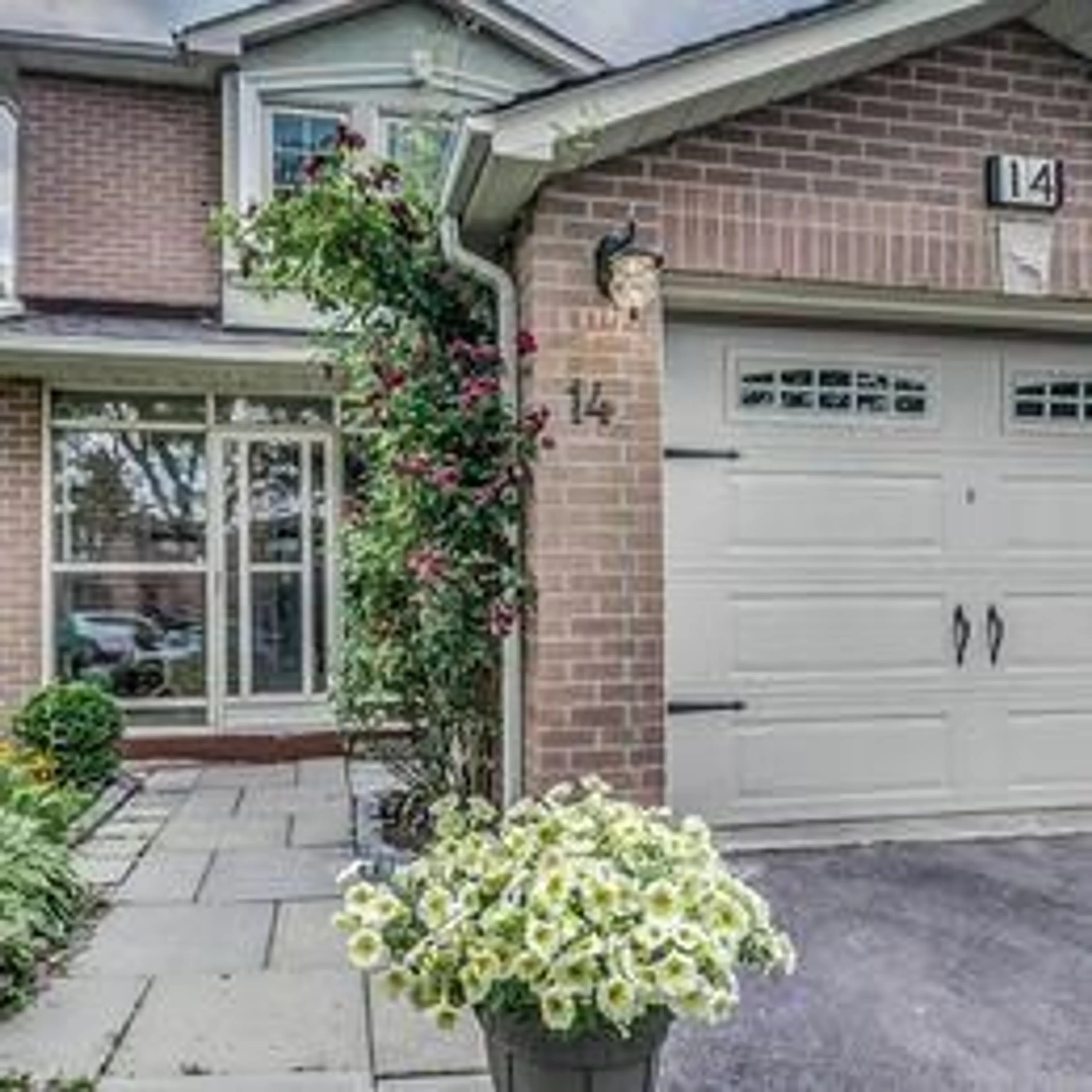 Home with brick exterior material, street for 14 Barrett Cres, Ajax Ontario L1T 2C7