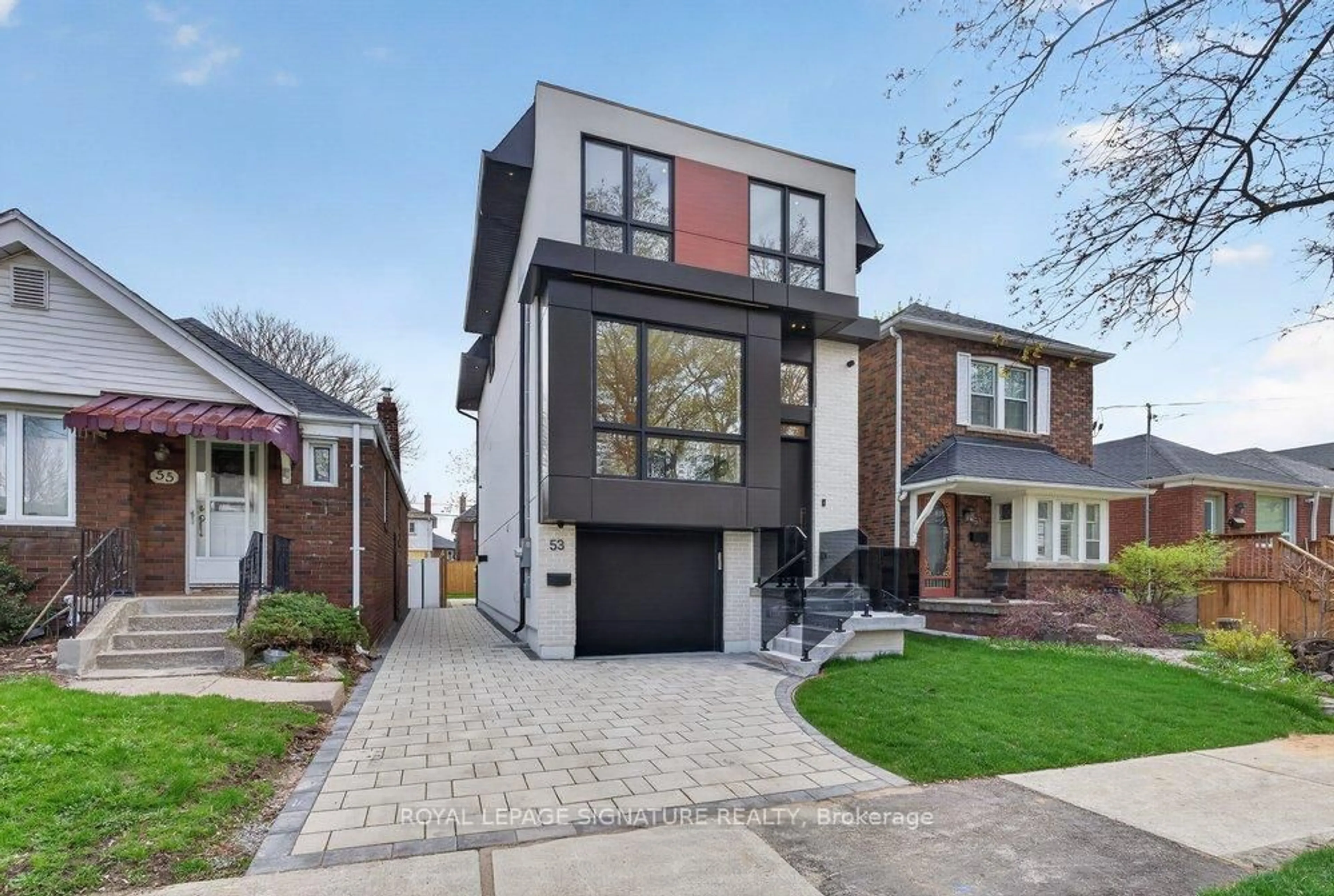 Home with brick exterior material, street for 53 Lesmount Ave, Toronto Ontario M4J 3V7