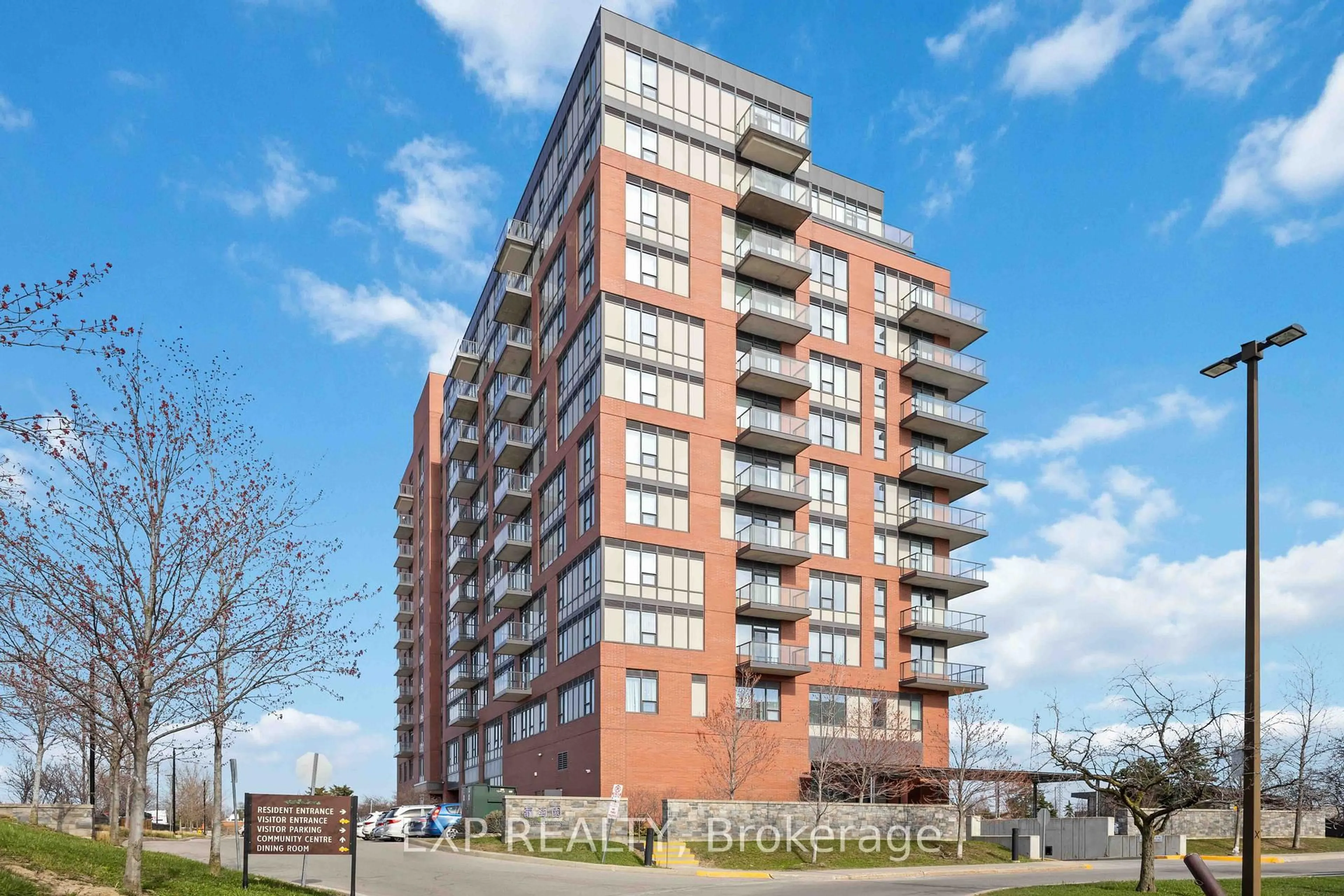 A pic from outside/outdoor area/front of a property/back of a property/a pic from drone, building for 1038 McNicoll Ave #316, Toronto Ontario M1W 0A4