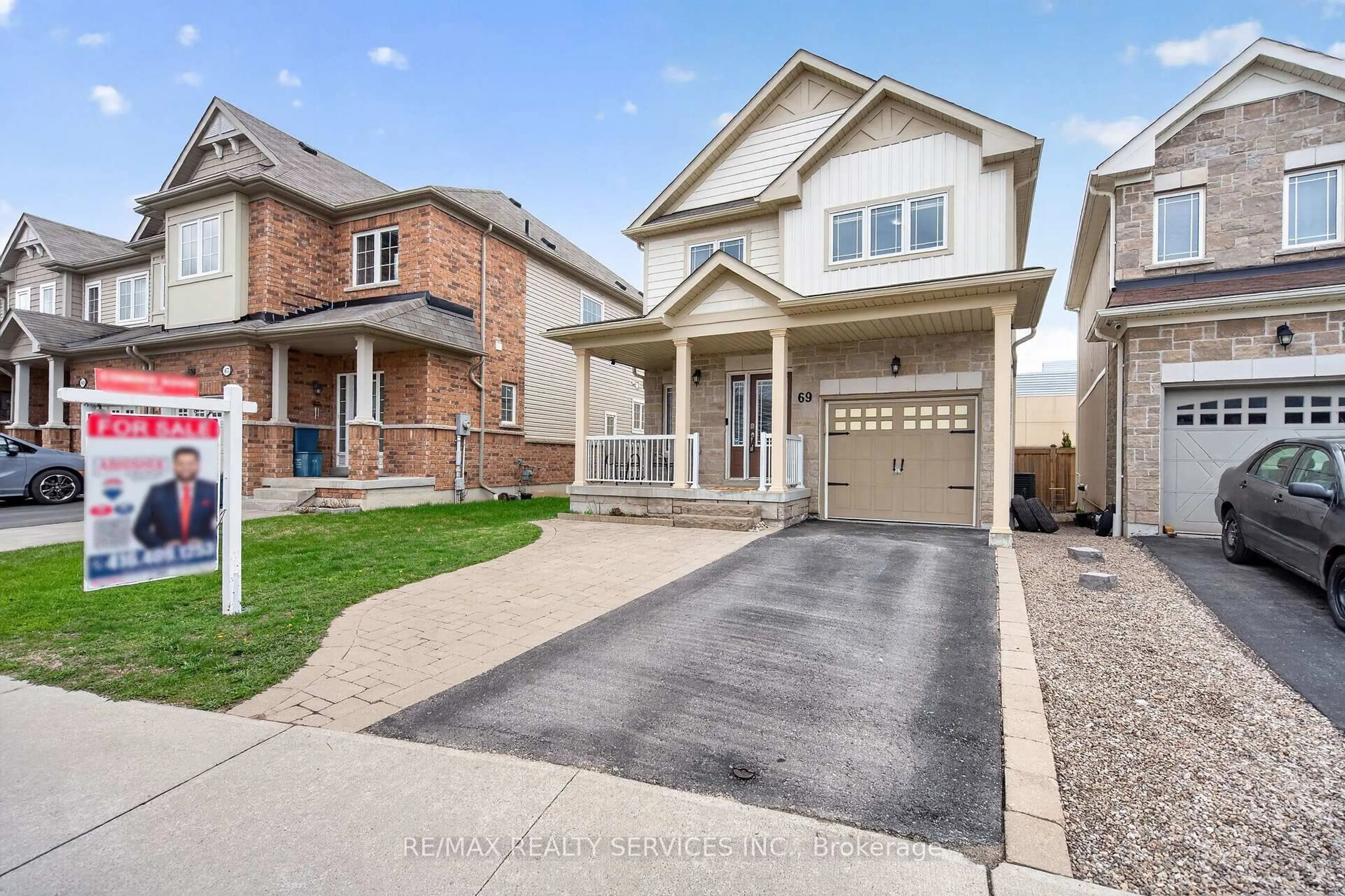 Home with brick exterior material, street for 69 Mantz Cres, Whitby Ontario L1R 0L2