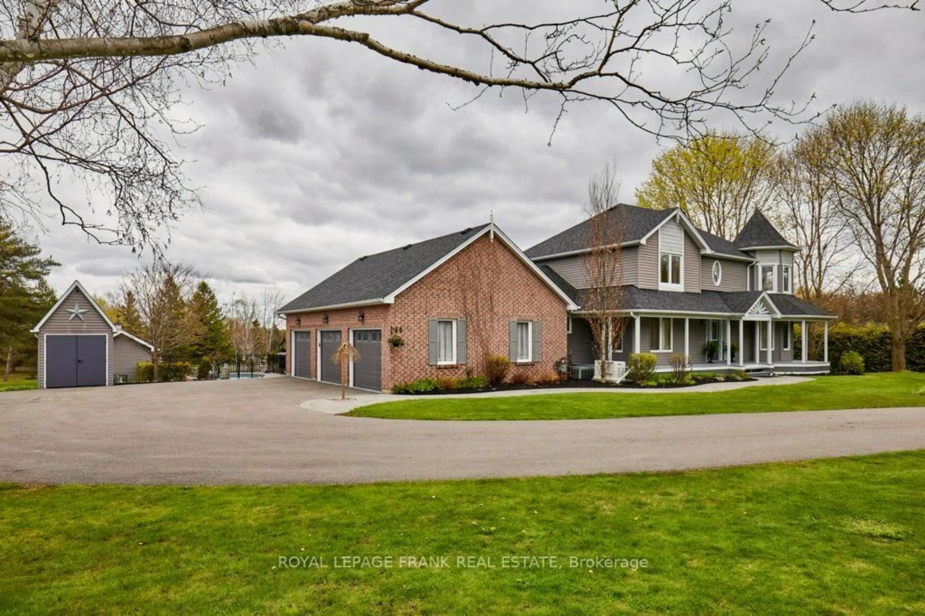 Home with brick exterior material, street for 14 Cawkers Cove Rd, Scugog Ontario L9L 1P4