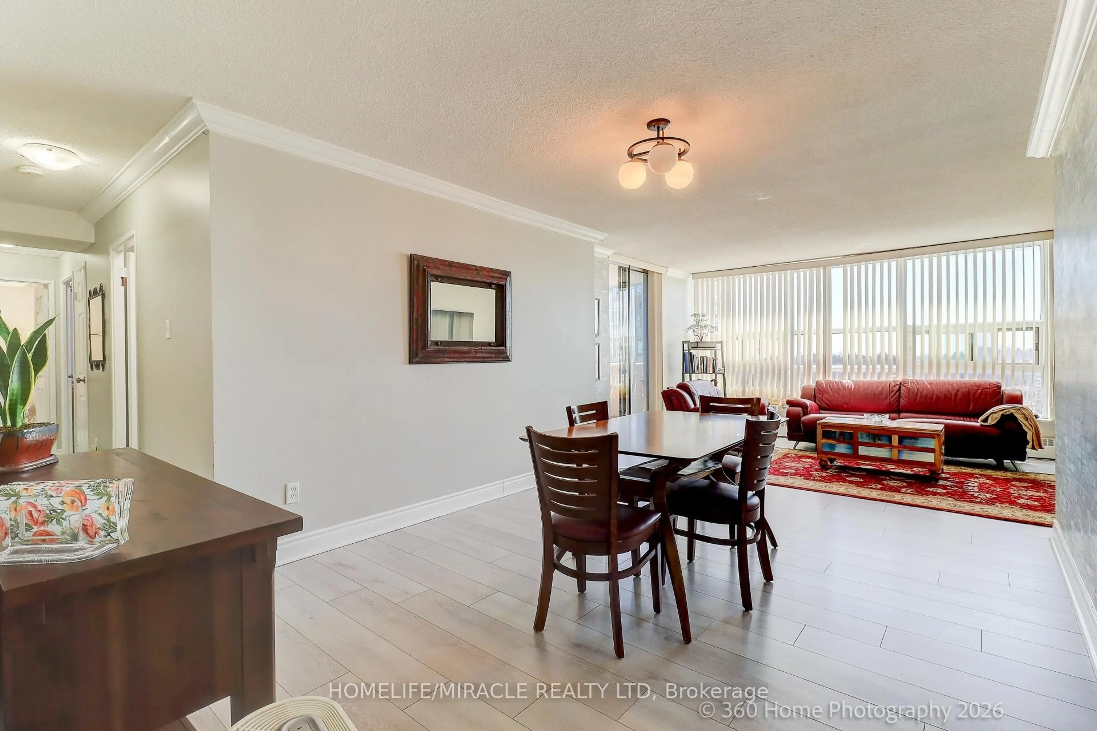 Living room with furniture, wood/laminate floor for 3380 Eglinton Ave #909, Toronto Ontario M1J 3L6